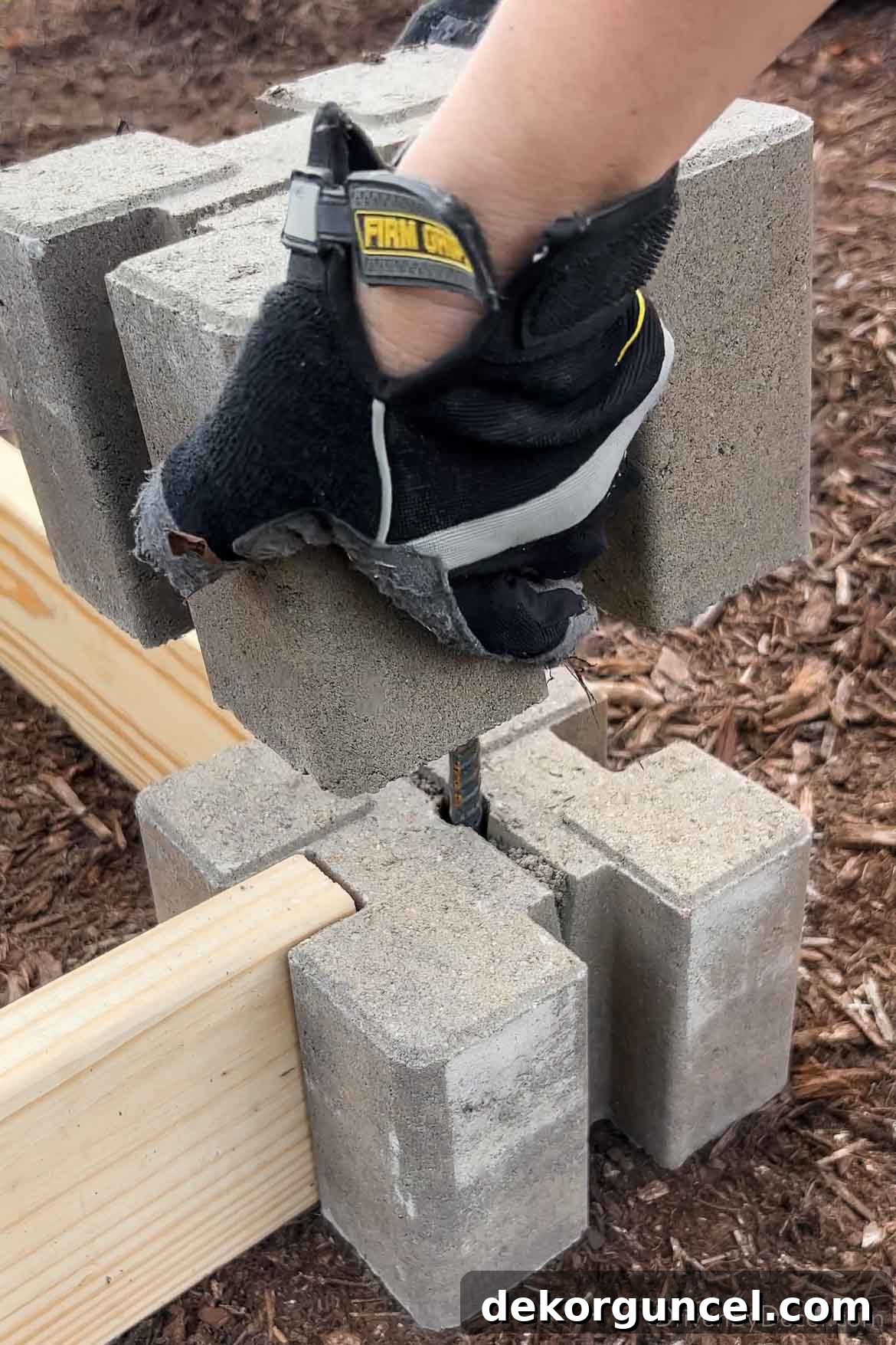 6 Budget-Friendly Raised Garden Bed Ideas 7 Stacking one corner block on the other to create a two-tier raised garden bed