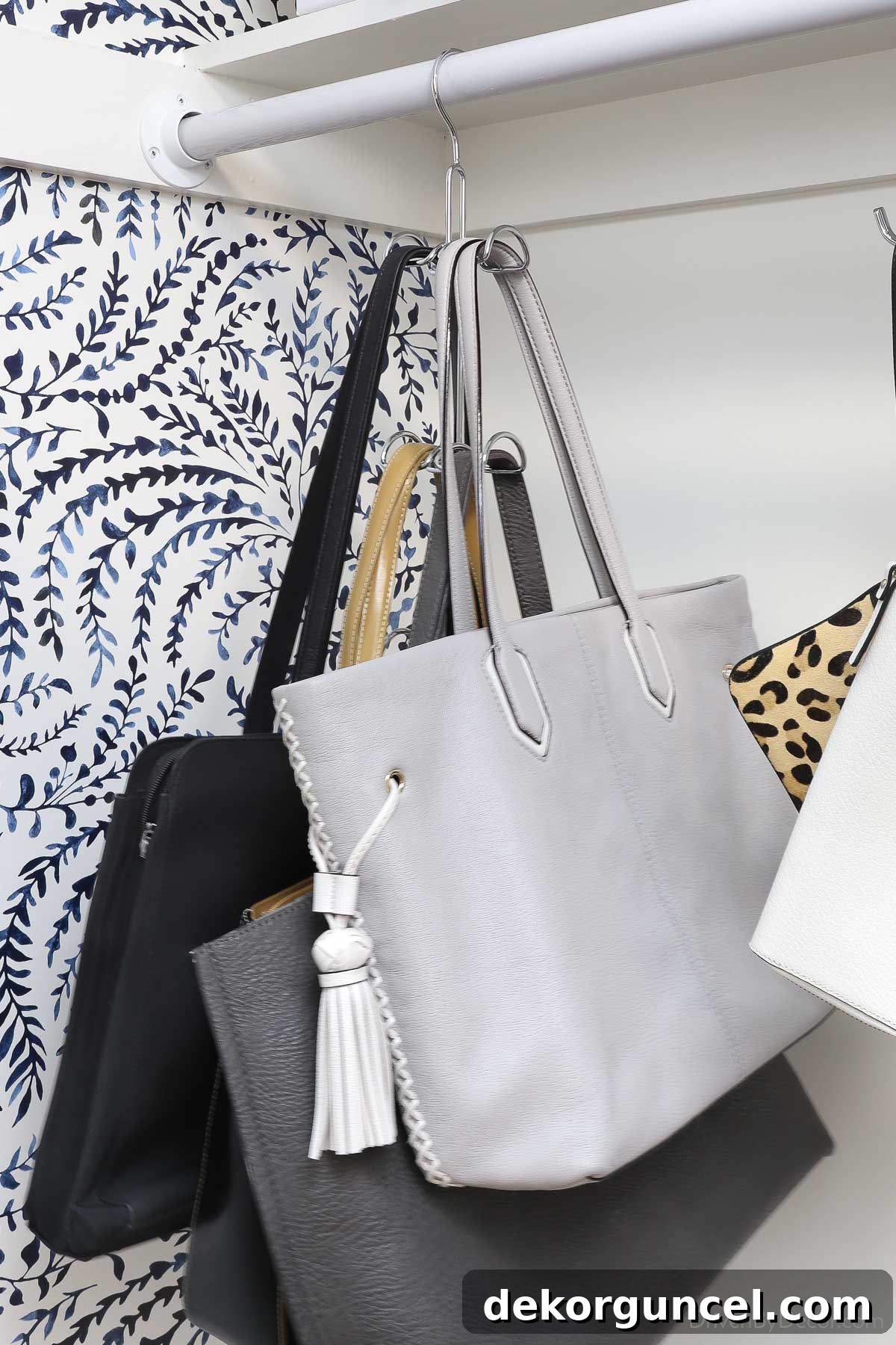 Closet hanger efficiently displaying multiple tote bags, a smart solution for handbag organization