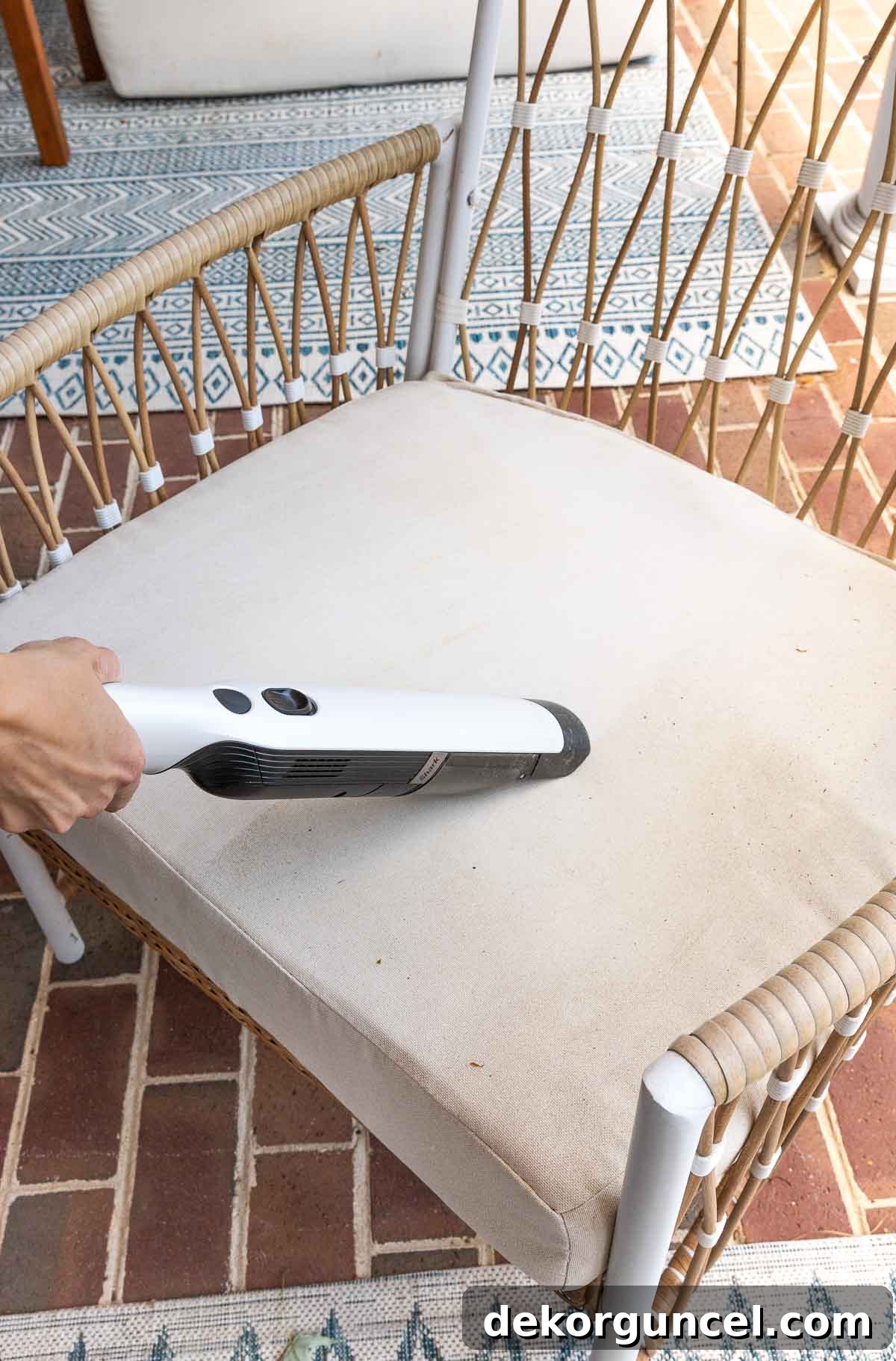 Banish Pollen: Essential Tools for a Spotless Porch & Outdoor Furniture 2 Vacuuming as first step in cleaning outdoor cushions, removing pollen and debris