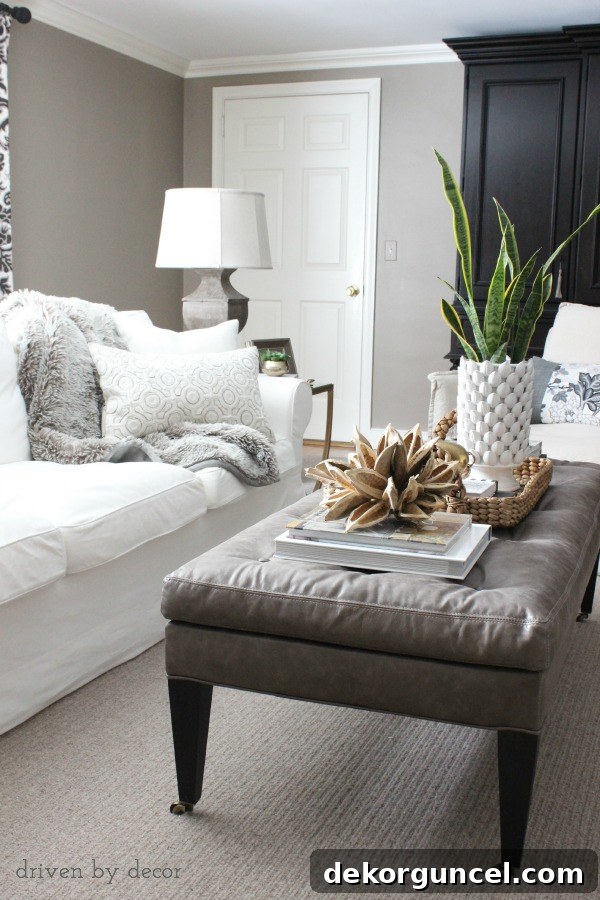 Guide to choosing the perfect size coffee table for your living room, focusing on height, length, and placement.