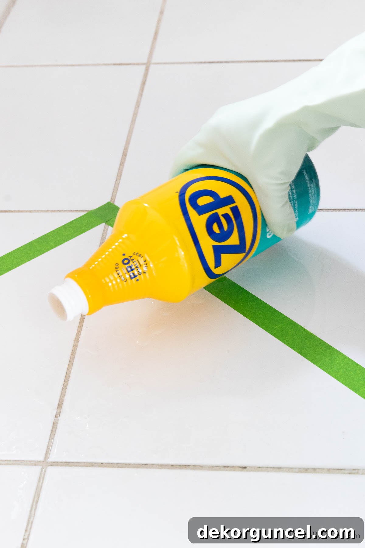 Pouring Zep grout cleaner onto grout
