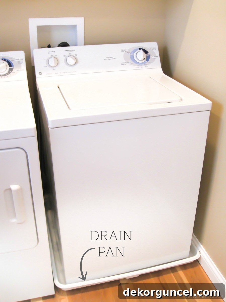 A must-have for a second floor laundry room - a drain pan under the washer!