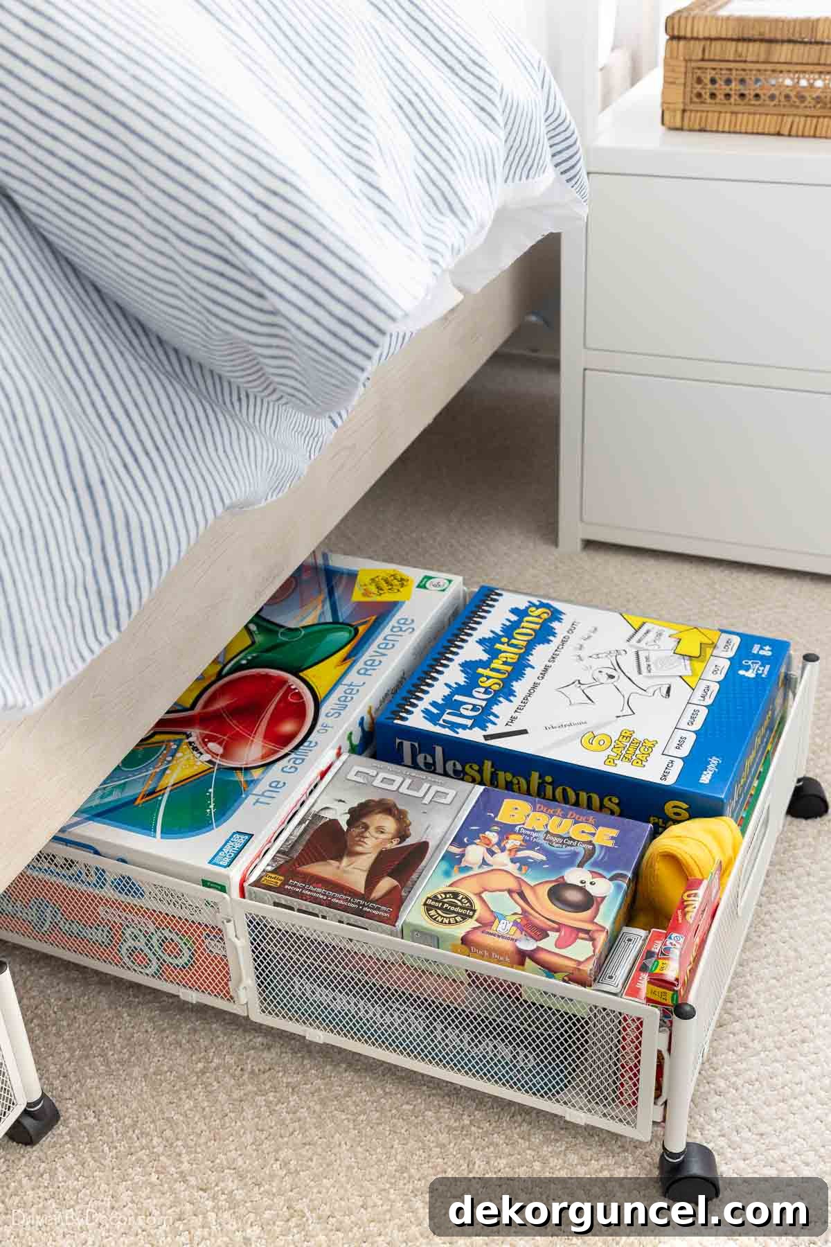 Rolling under-bed storage containers, ideal for games and puzzles, as a bedroom organization idea
