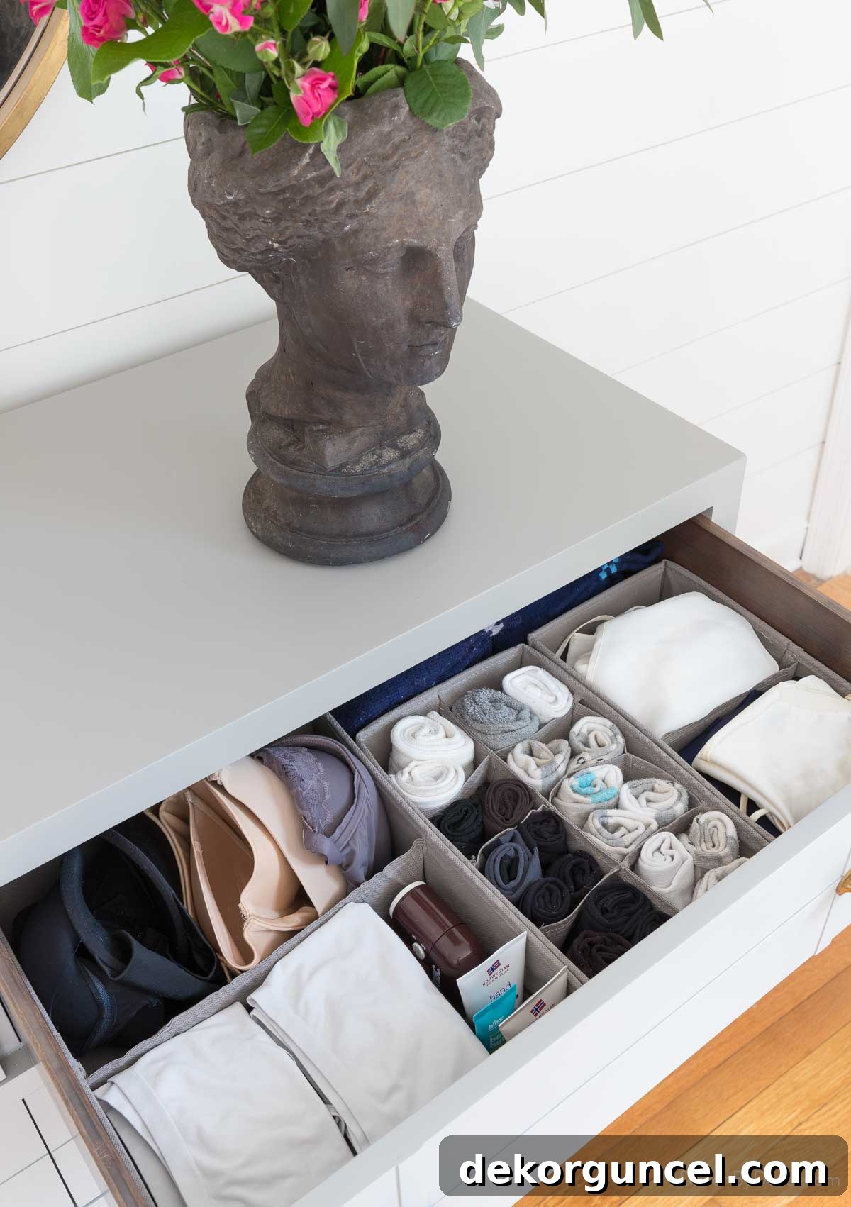 Deep drawer organized with fabric dividers for socks and underwear