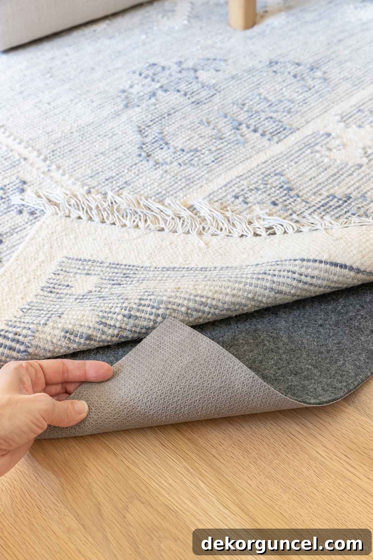 Close-up of a felt and natural rubber hybrid rug pad, ideal for hardwood floors