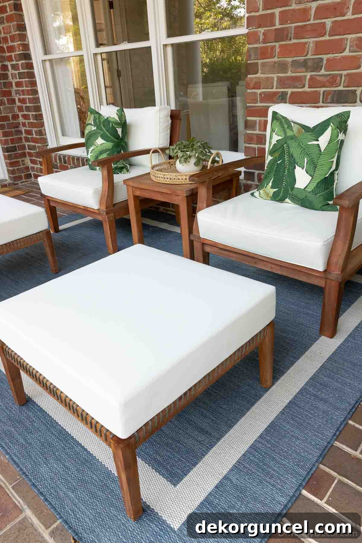 Outdoor lounge chairs with matching ottomans, illustrating an outdoor rug scenario