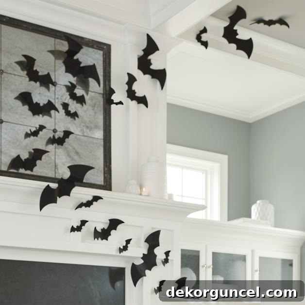 Simple, Spooky, and Fun Halloween Porch Decor Ideas 16 Felt bats on fireplace surround