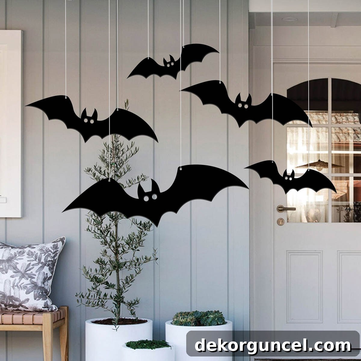 Simple, Spooky, and Fun Halloween Porch Decor Ideas 18 Hanging metal bats for front porch Halloween decor