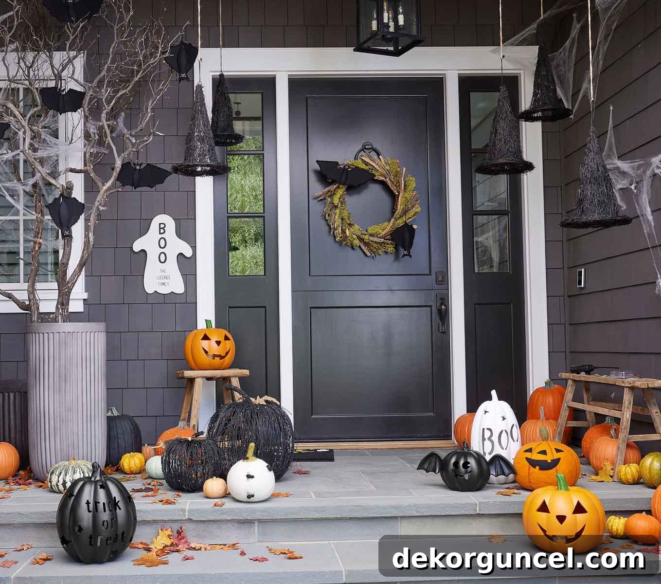 Simple, Spooky, and Fun Halloween Porch Decor Ideas 7 Floating witch hats on front porch for Halloween