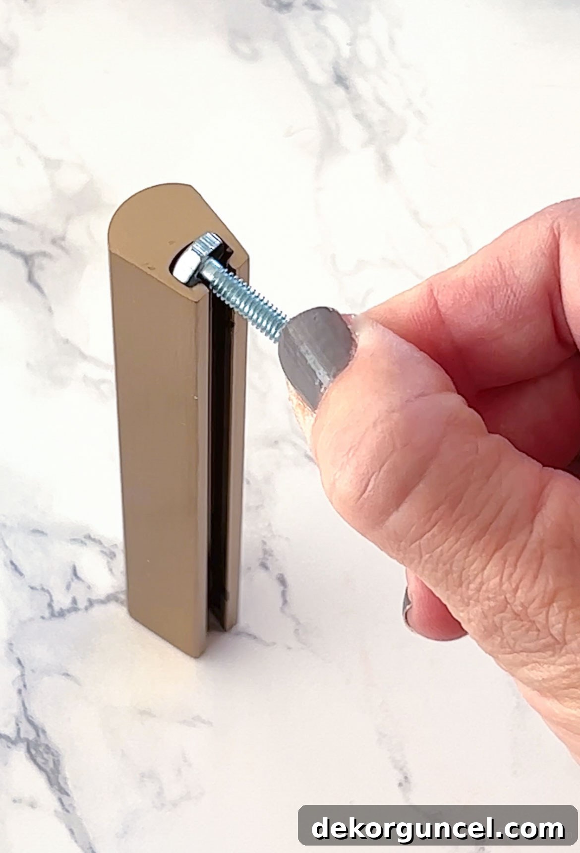 Fixing Misaligned Cabinet Pull Holes 3 Screw head that fits in opening of adjustable cabinet pull