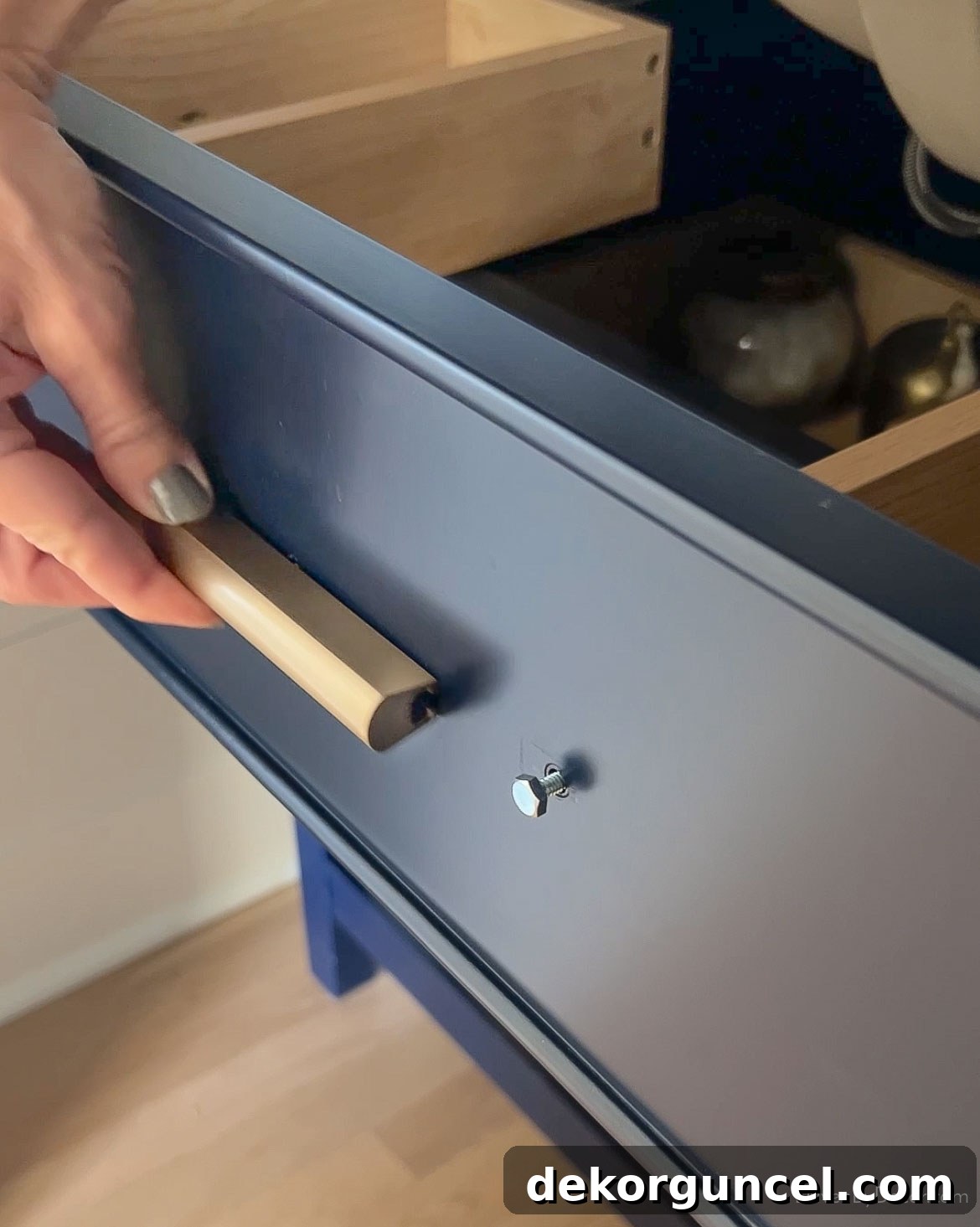 Fixing Misaligned Cabinet Pull Holes 4 Sliding pulls over screw heads - the perfect solution for cabinet holes that are an odd size