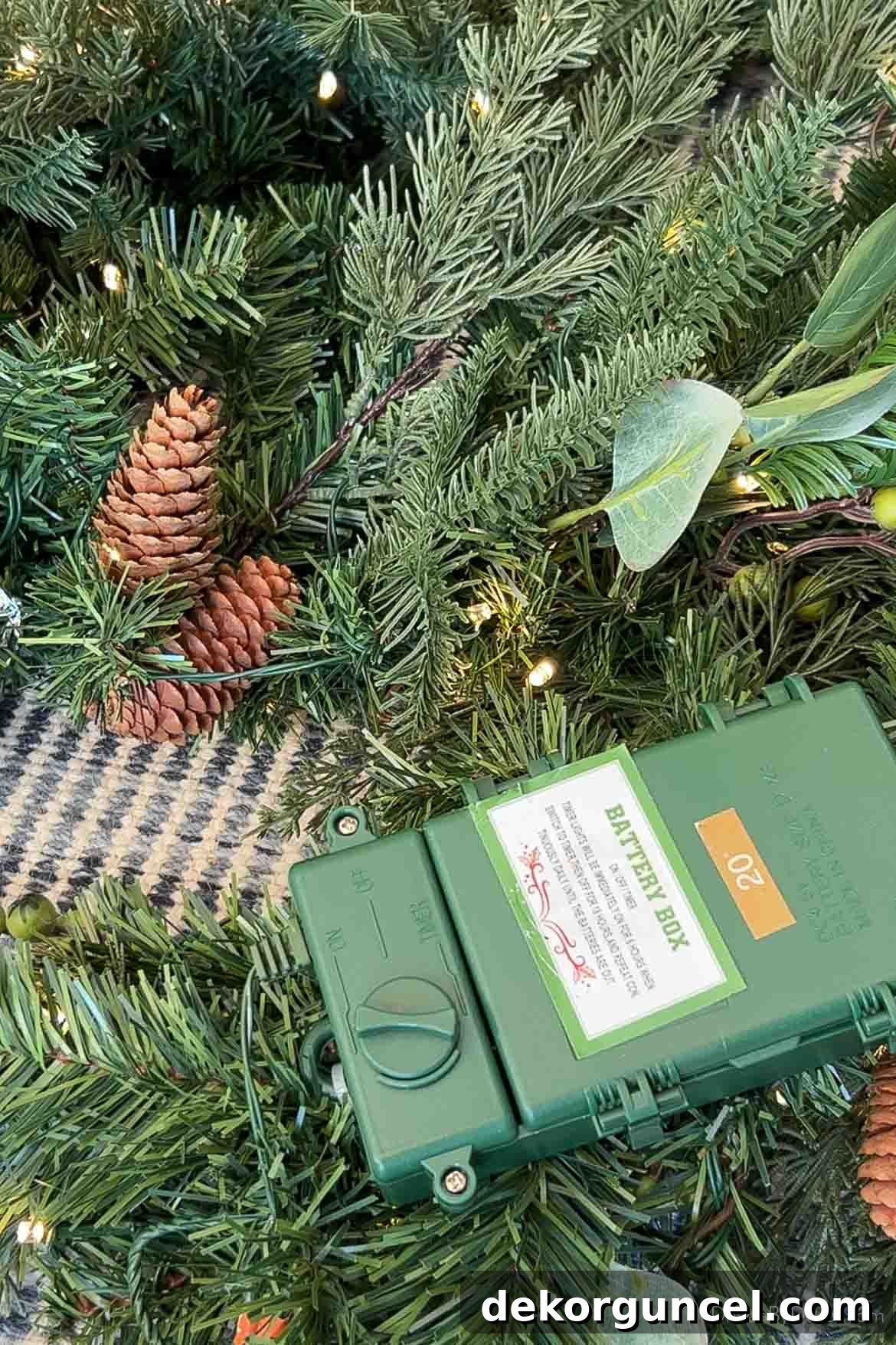 Battery pack on fireplace mantel garland