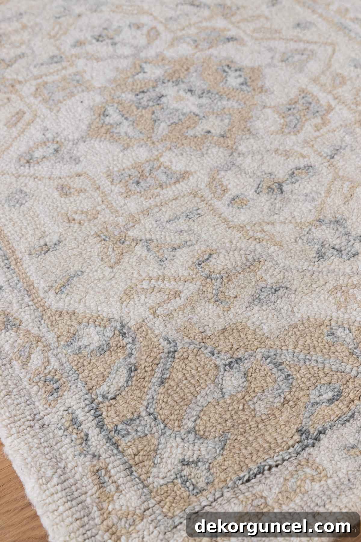 Patterned neutral rug with a modern Oushak vibe