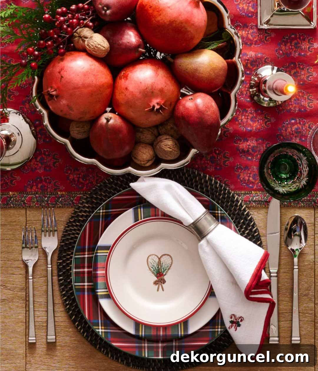 Christmas table decor with centerpiece of pomegranates and nuts