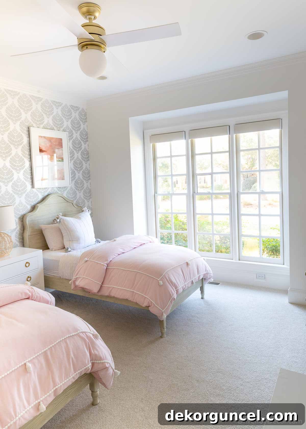 Girls' bedroom featuring two twin beds, ready for a modern transformation