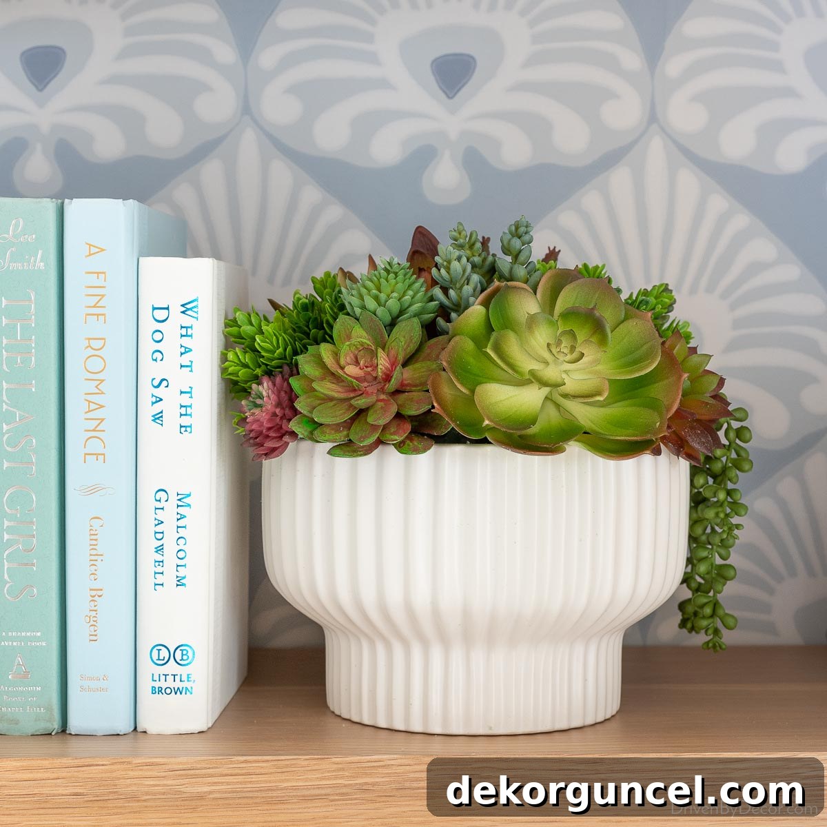 Everyday Dining Table Centerpiece Ideas 11 Realistic faux succulents in a decorative bowl on a wood shelf
