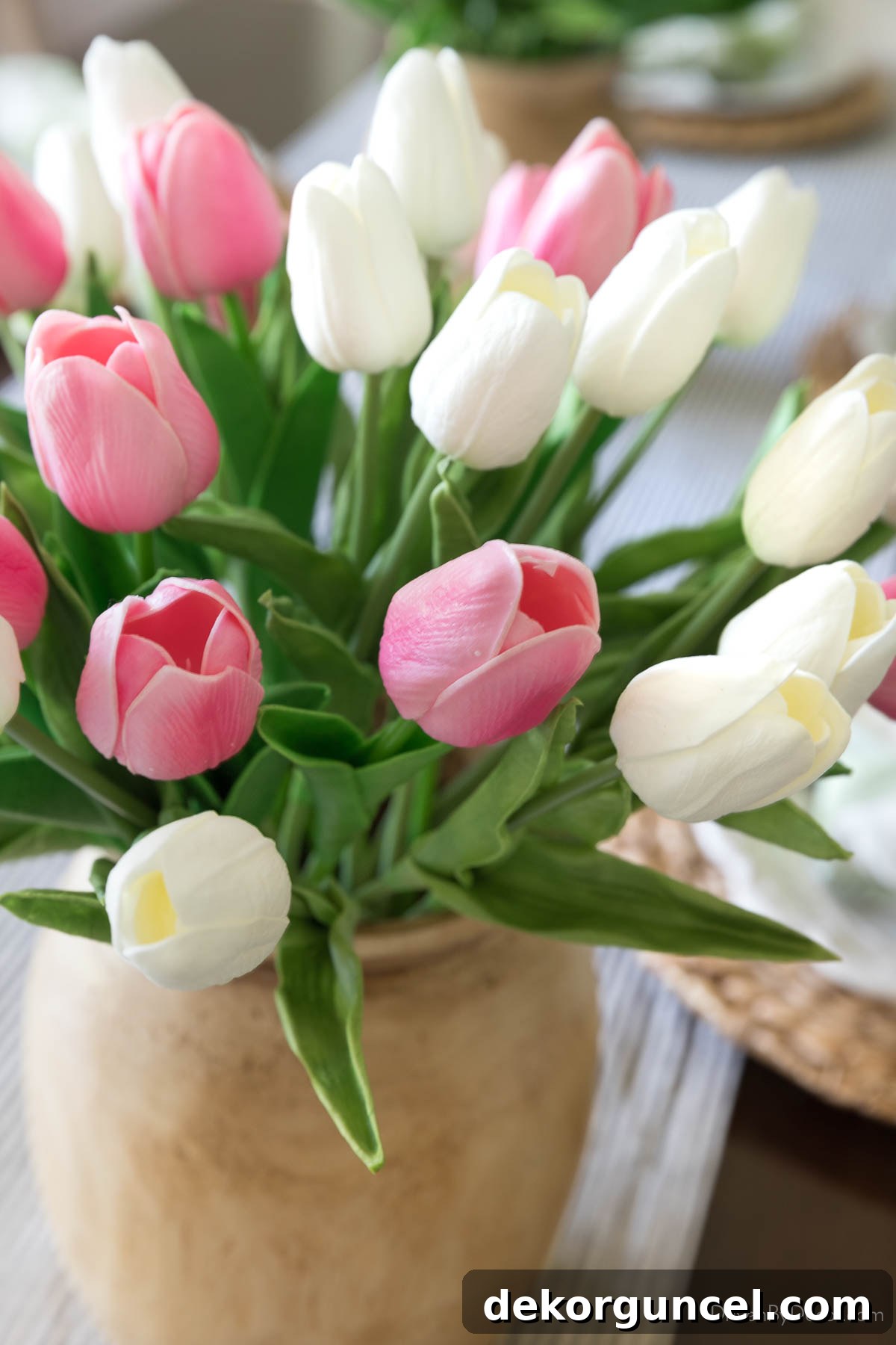Everyday Dining Table Centerpiece Ideas 20 Close-up view of highly realistic faux tulips in a centerpiece