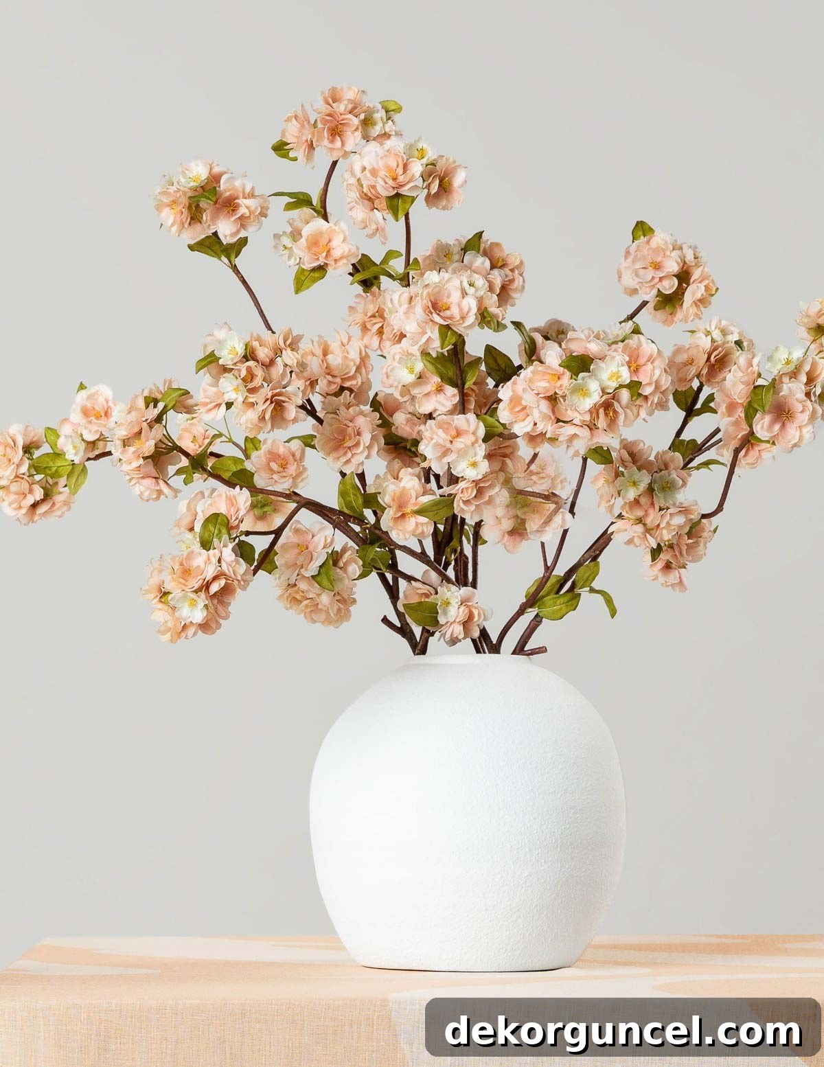 Everyday Dining Table Centerpiece Ideas 4 Round white concrete vase with flowers, a modern dining table centerpiece