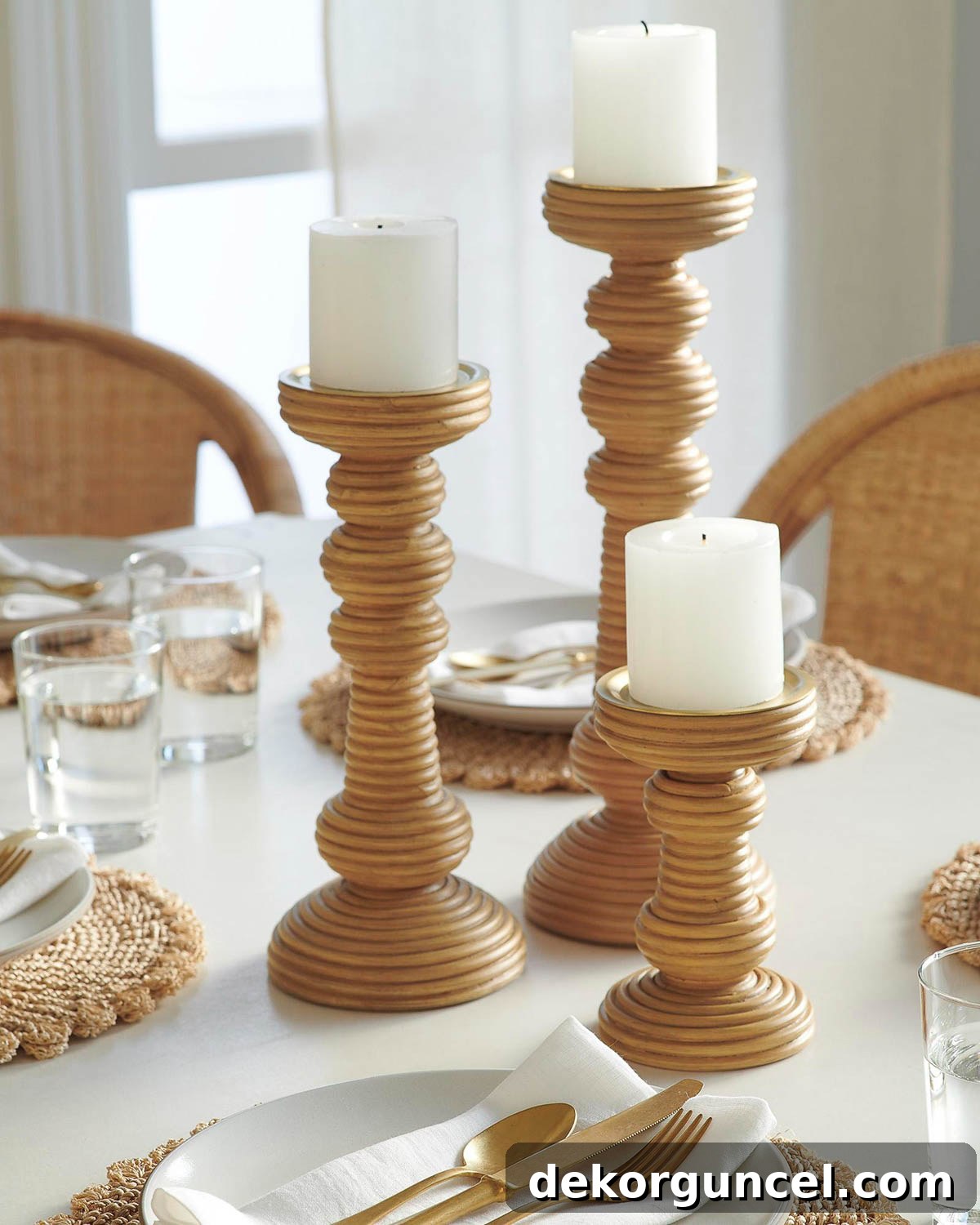 Everyday Dining Table Centerpiece Ideas 31 Charming group of three rattan candlesticks forming a cohesive table centerpiece