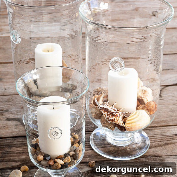 Everyday Dining Table Centerpiece Ideas 36 Elegant glass hurricanes filled with pebbles and shells for a unique centerpiece