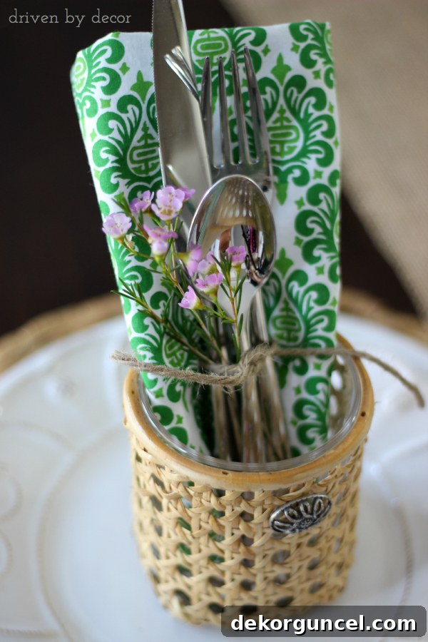 Tie a small floral sprig with silverware