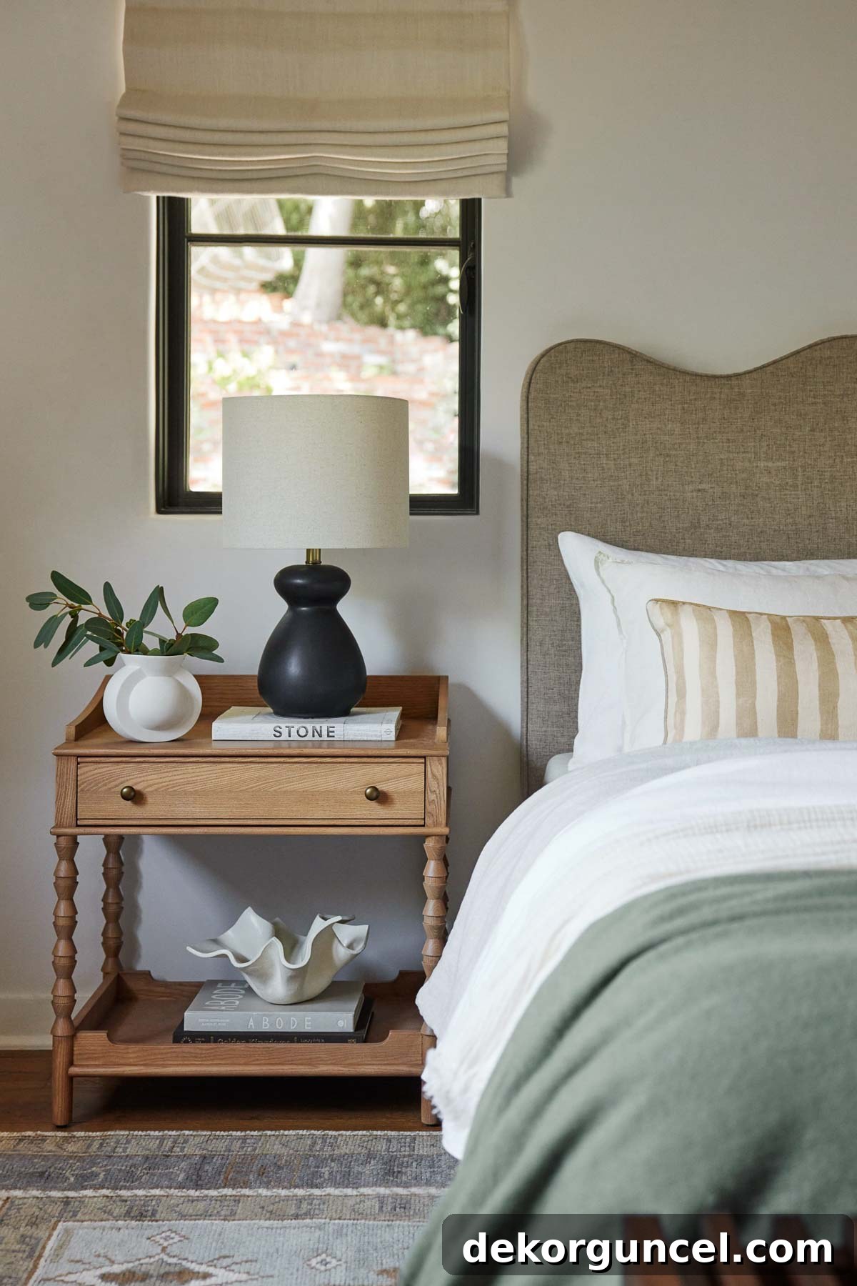 Elevate Your Bedside Style 23 Beautifully styled nightstand with light, greenery, and book