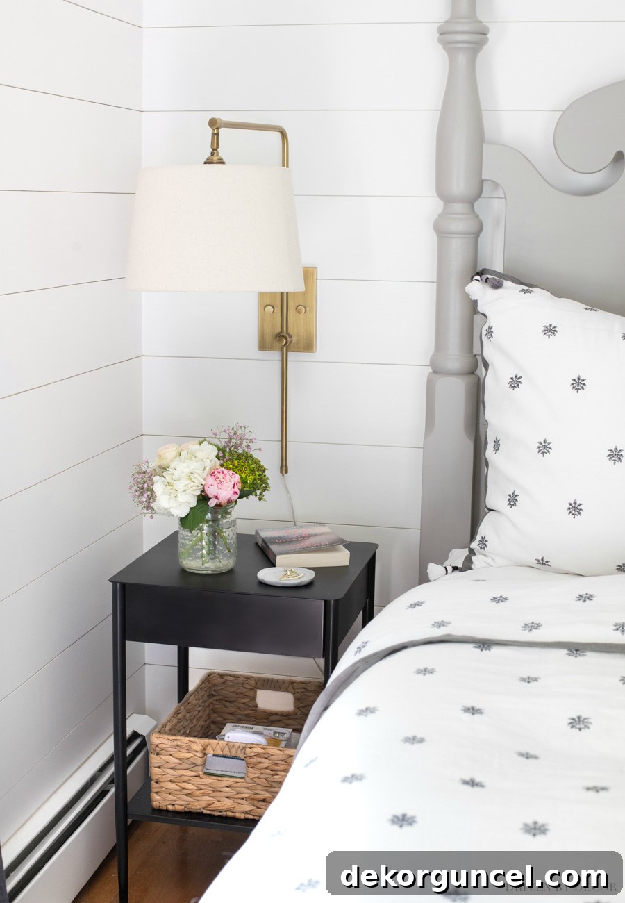 Elevate Your Bedside Style 26 A great small, narrow black nightstand that's perfect for small bedrooms!