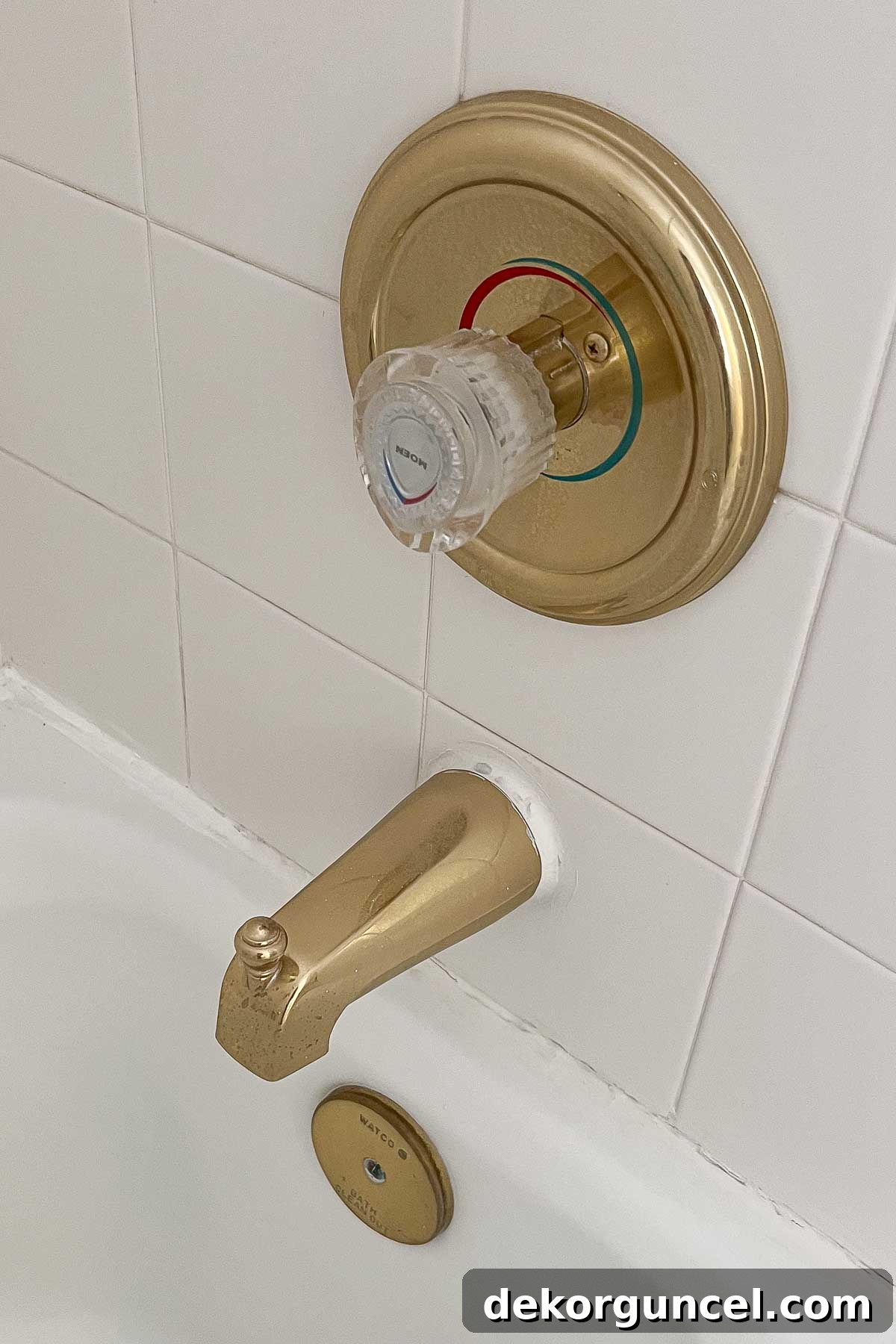 15 Budget-Friendly Bathroom Remodel Ideas 15 Dated tub/shower hardware
