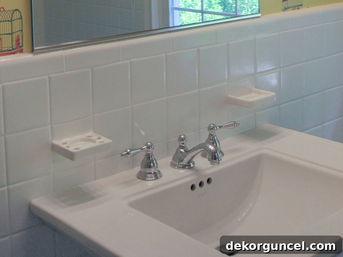 15 Budget-Friendly Bathroom Remodel Ideas 31 Toothbrush and soap holders integrated into tile