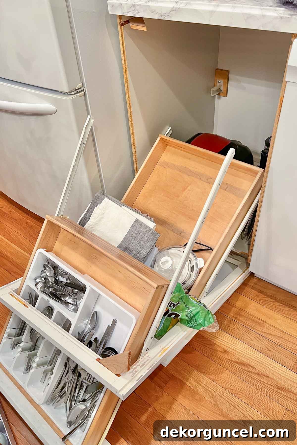 Kitchen Remodel Ideas and Products 4 Close-up of a broken kitchen cabinet demonstrating the urgent need for renovation