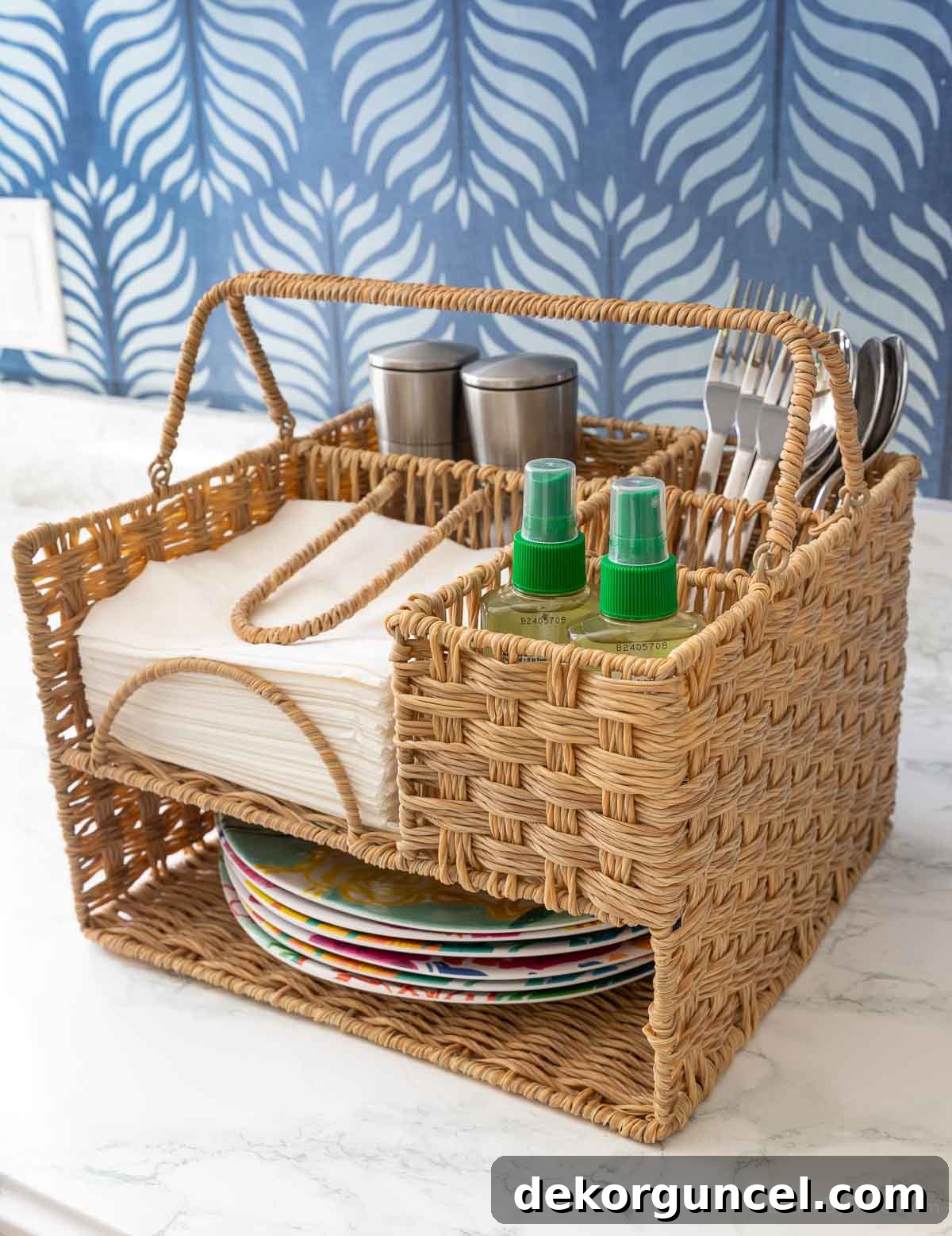 10 Smart Buys for Affordable Home Style 3 A beautifully organized woven serving caddy, holding plates, napkins, silverware, and spices for outdoor dining.