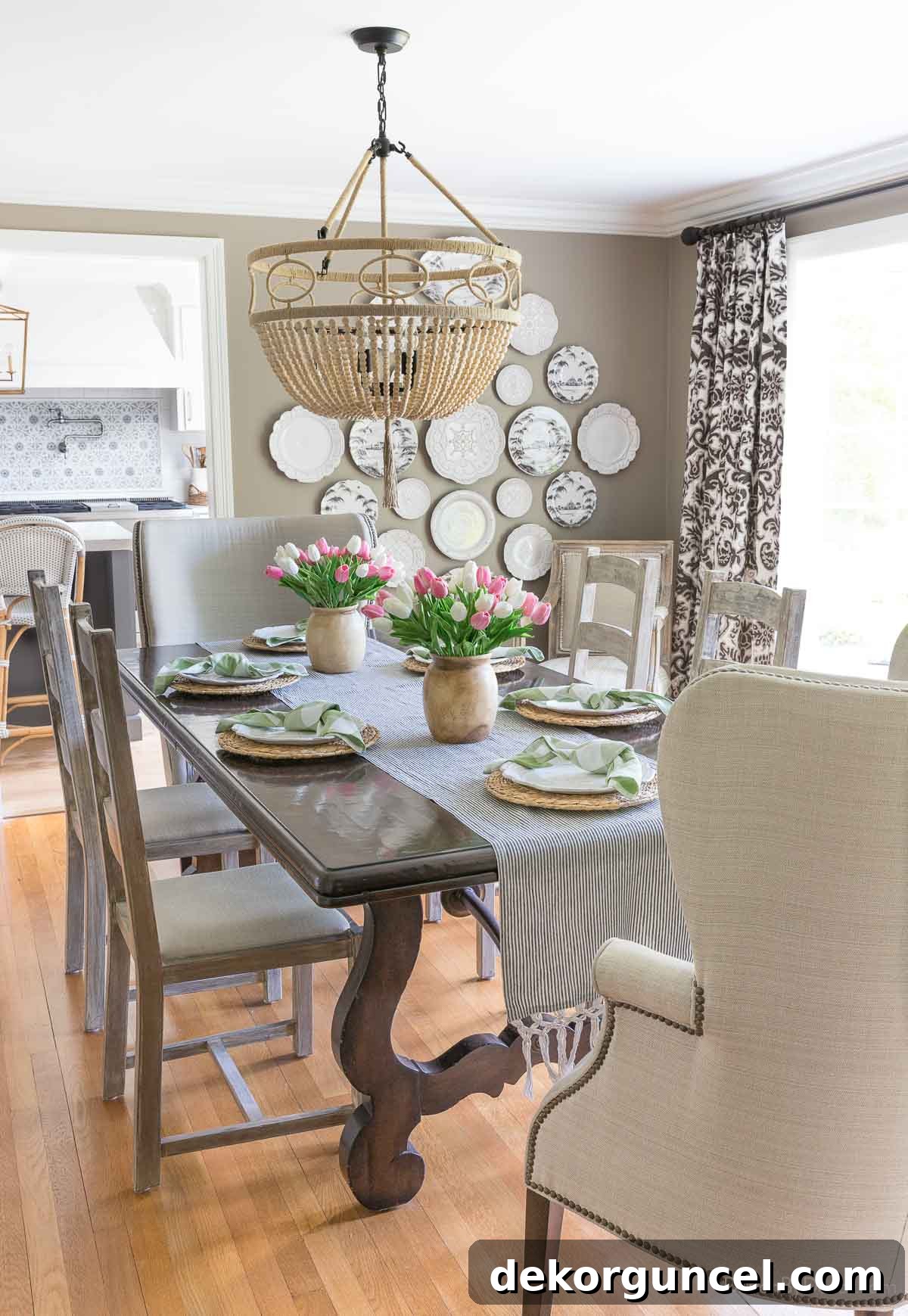 10 Smart Buys for Affordable Home Style 26 Two elegant wood vases holding faux tulips, arranged beautifully as a dining table centerpiece.