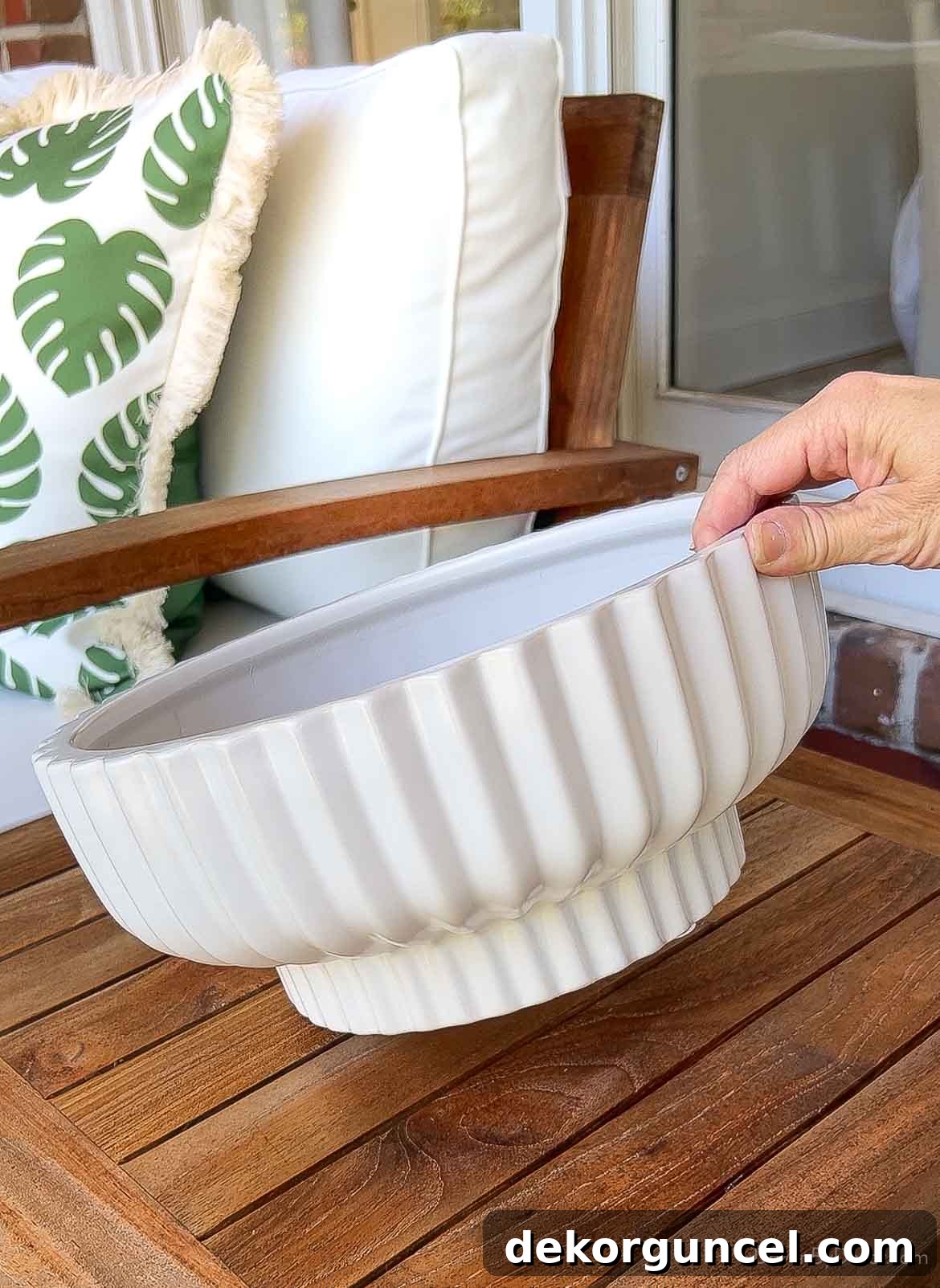 10 Smart Buys for Affordable Home Style 7 A chic, affordable ceramic planter, showcasing its simple elegance and versatility.