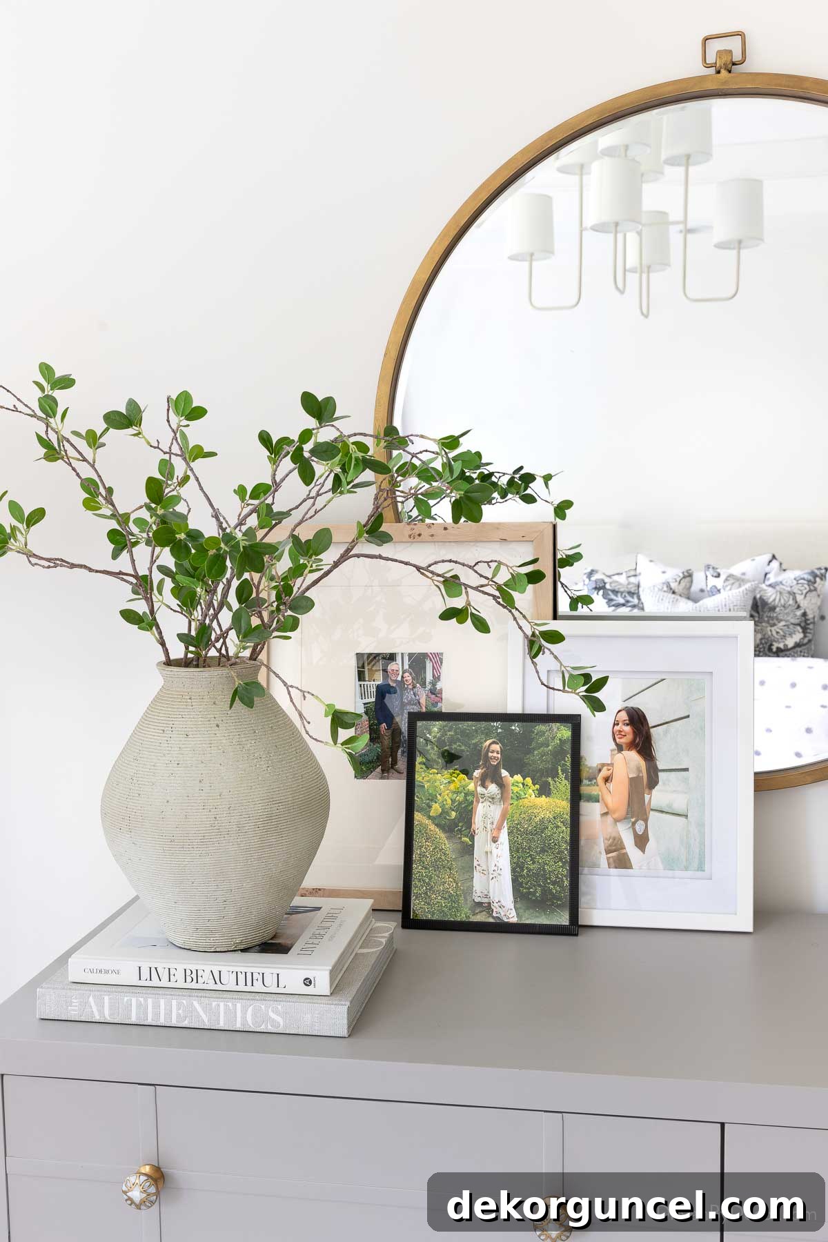 Curate Your Cozy Corner 10 Stylish Bedroom Updates 2 Family photos in overlapping frames as bedroom decor