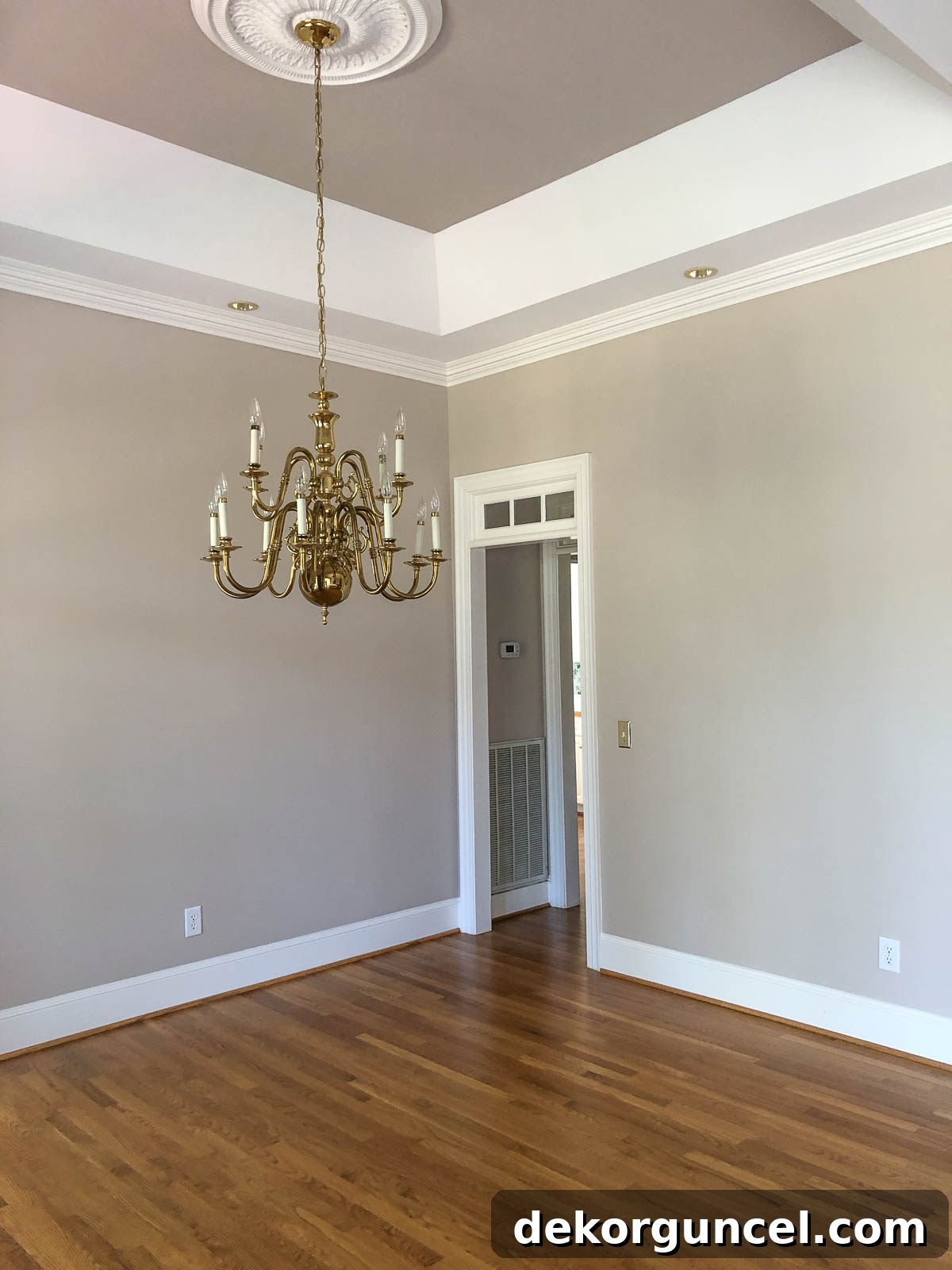 Before dining room renovation showing dated decor and columns