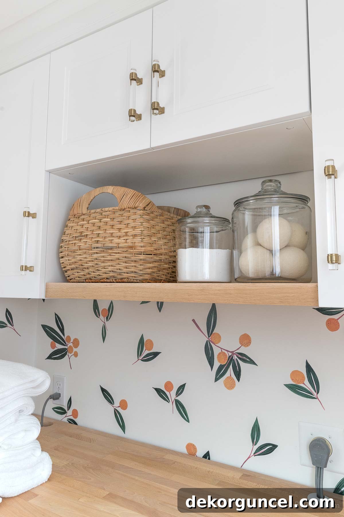 Organized Laundry Shelf with Basket and Decorative Glass Jars