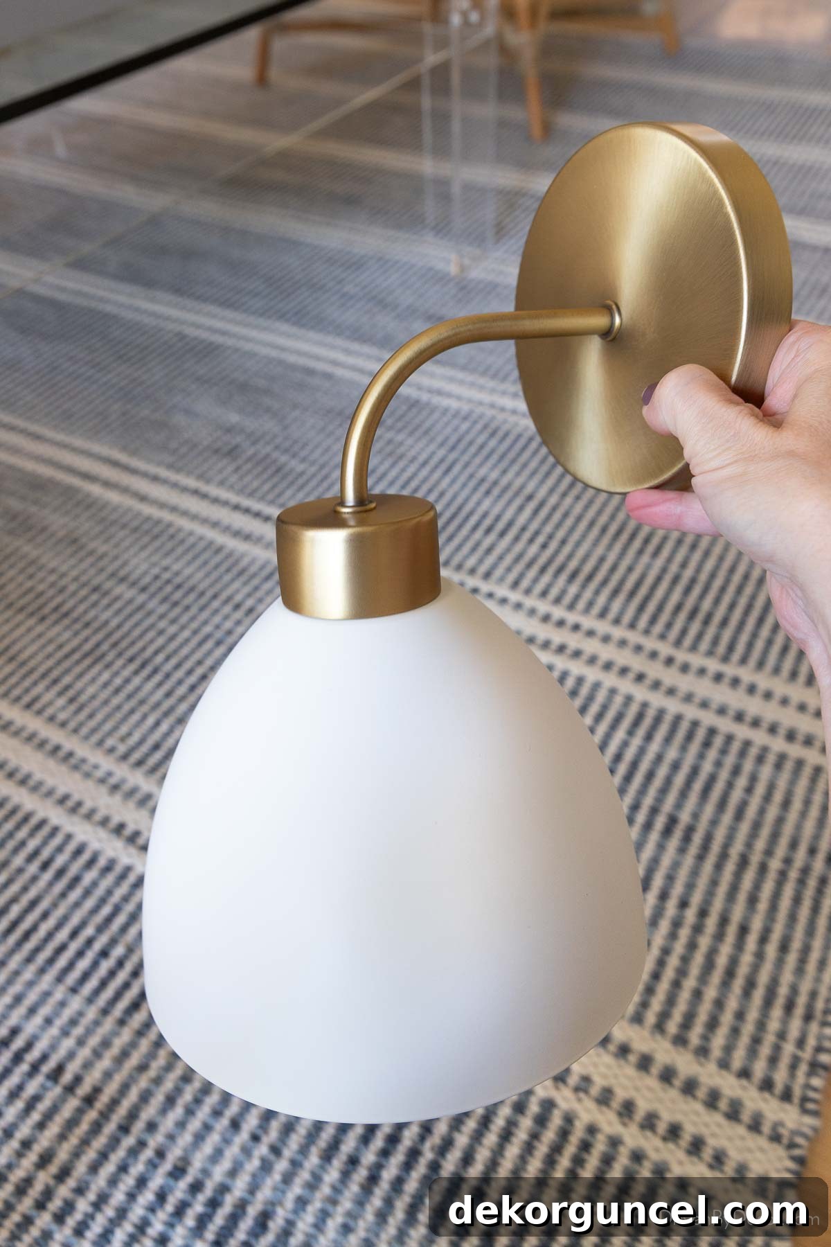 Single light black sconce with white shade that's super inexpensive