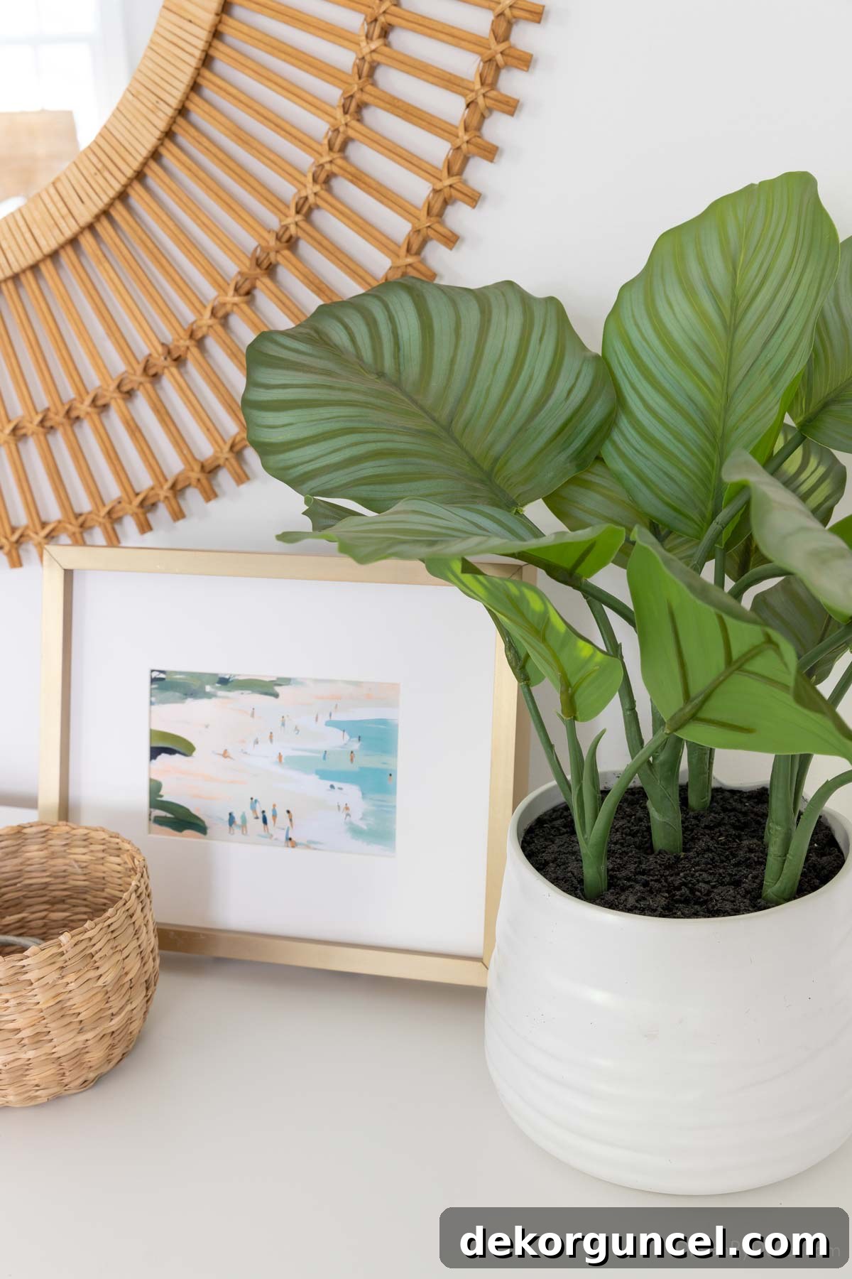 Easy Dresser Styling Ideas 11 Faux green plant with large leaves on bedroom dresser