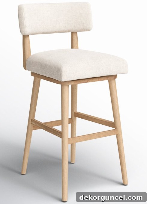 Comfortable upholstered swivel counter stool with a modern design