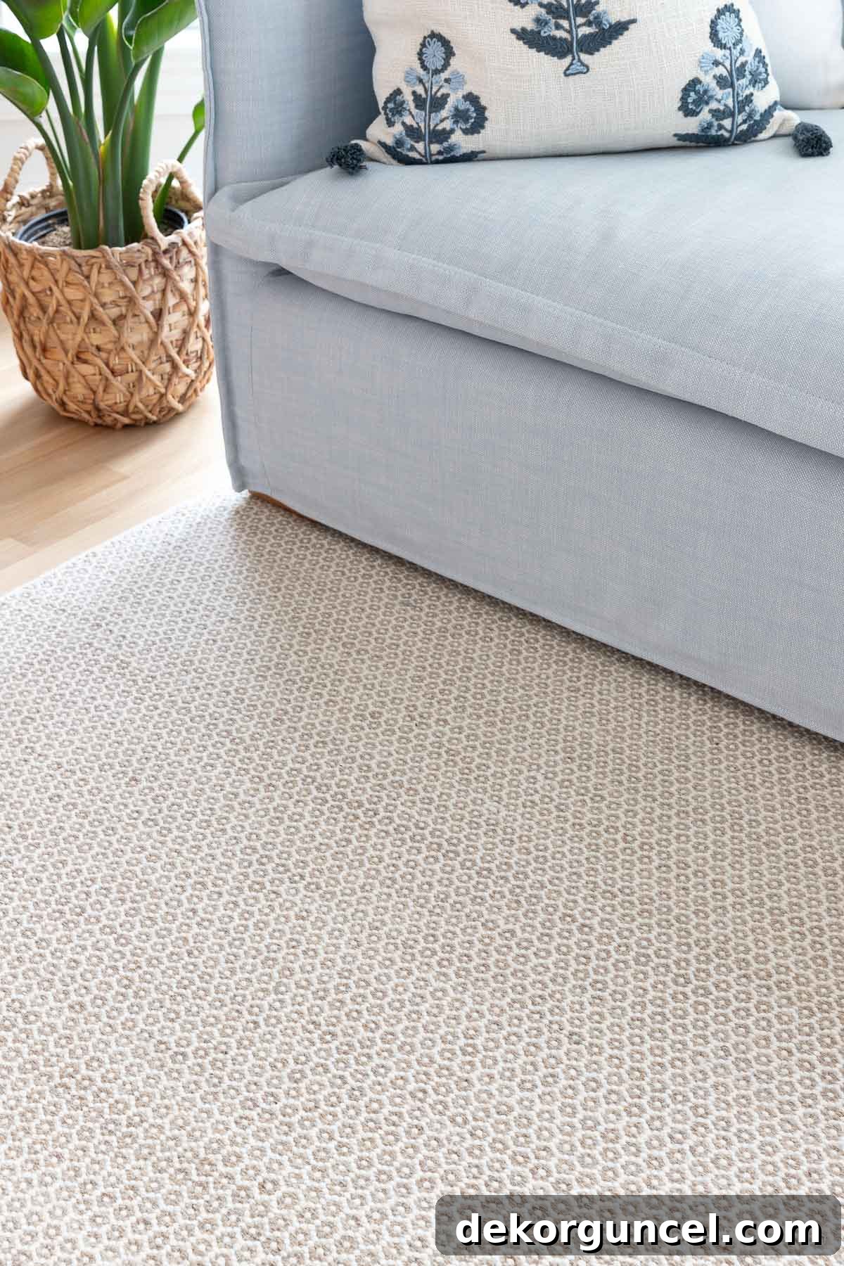 Chic honeycomb pattern rug in a natural hue, adding texture to a sunroom