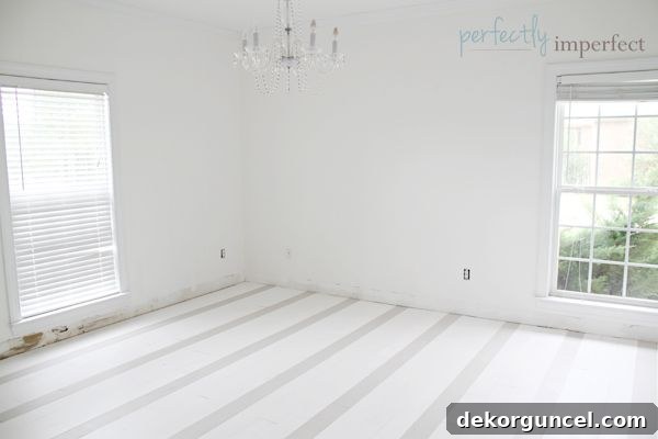 Gorgeous subtle stripe floors created with Annie Sloan Chalk Paint in Pure White and a Pure White/French Linen mix, sealed with lacquer, by Perfectly Imperfect.