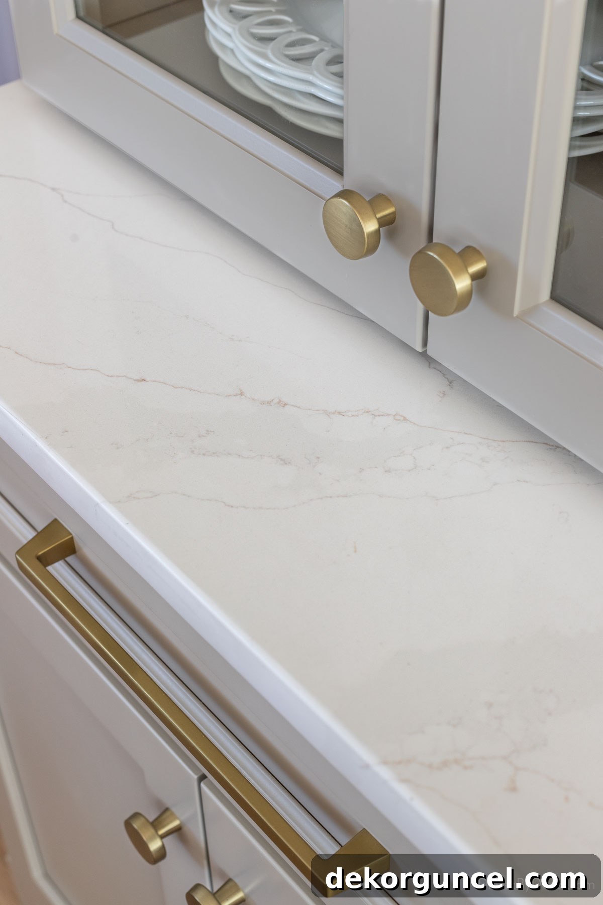 Our Kitchen's Cozy Coffee Corner 7 Detailed view of Viatera Calacatta Suprema quartz countertop with intricate veining