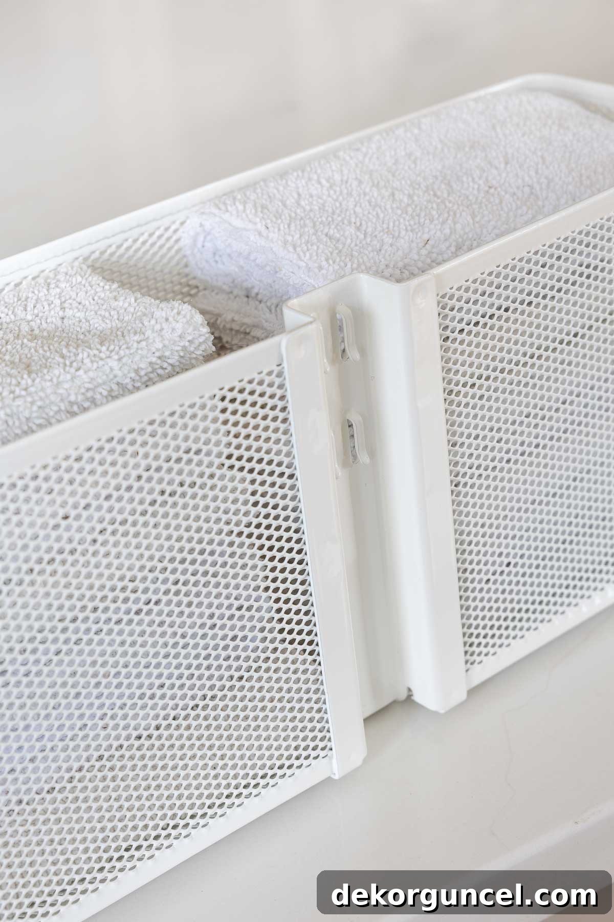 Declutter Your Home From Laundry Room Closet to Versatile Door Storage 14 Hooks on back of Elfa mesh basket