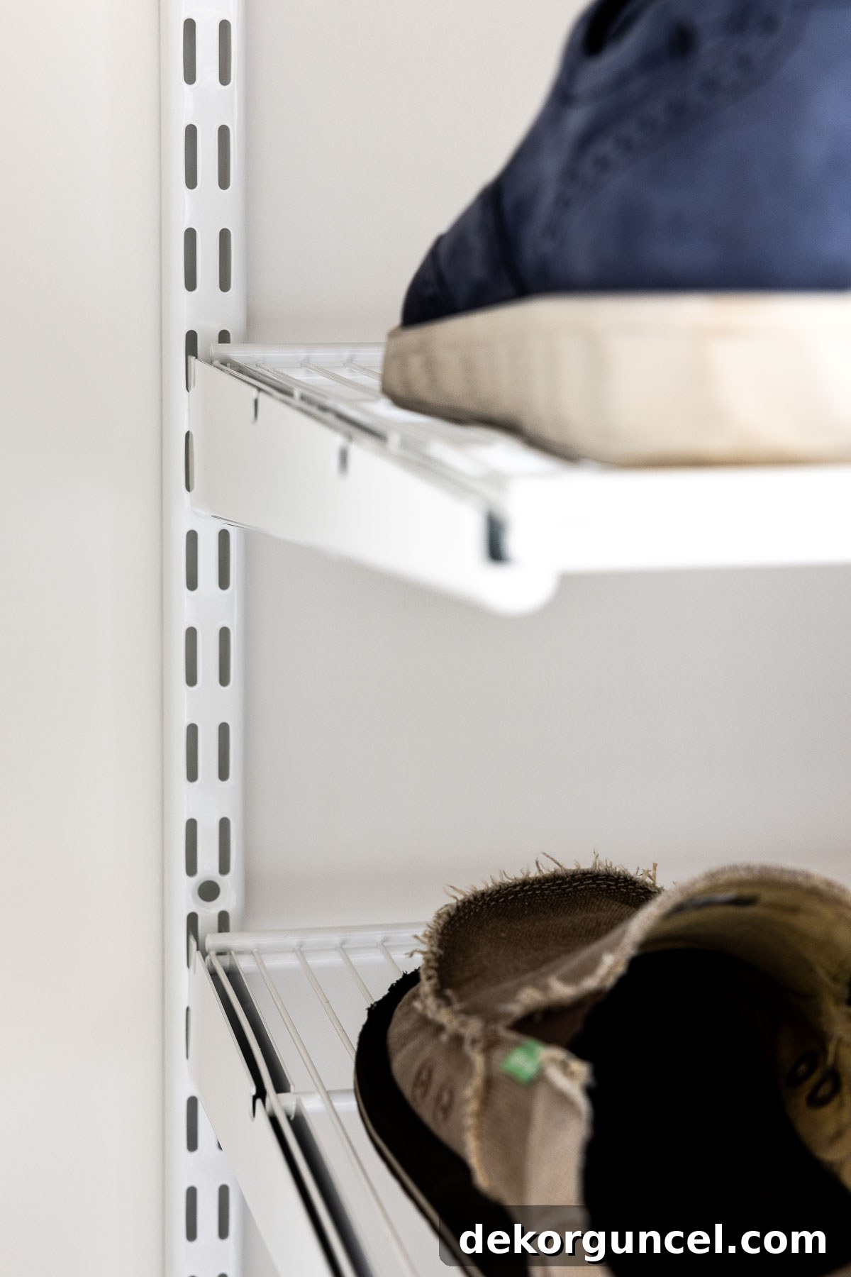 Declutter Your Home From Laundry Room Closet to Versatile Door Storage 5 Shelf brackets holding shelves as part of Elfa system