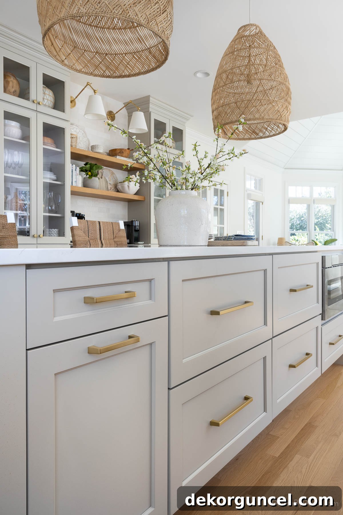 Gray shaker kitchen island cabinets, showcasing numerous deep drawers for optimal storage