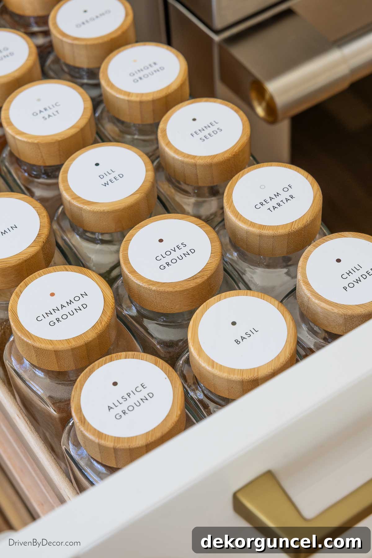 Organized spice pull-out in the kitchen, featuring labeled spice jars for easy identification