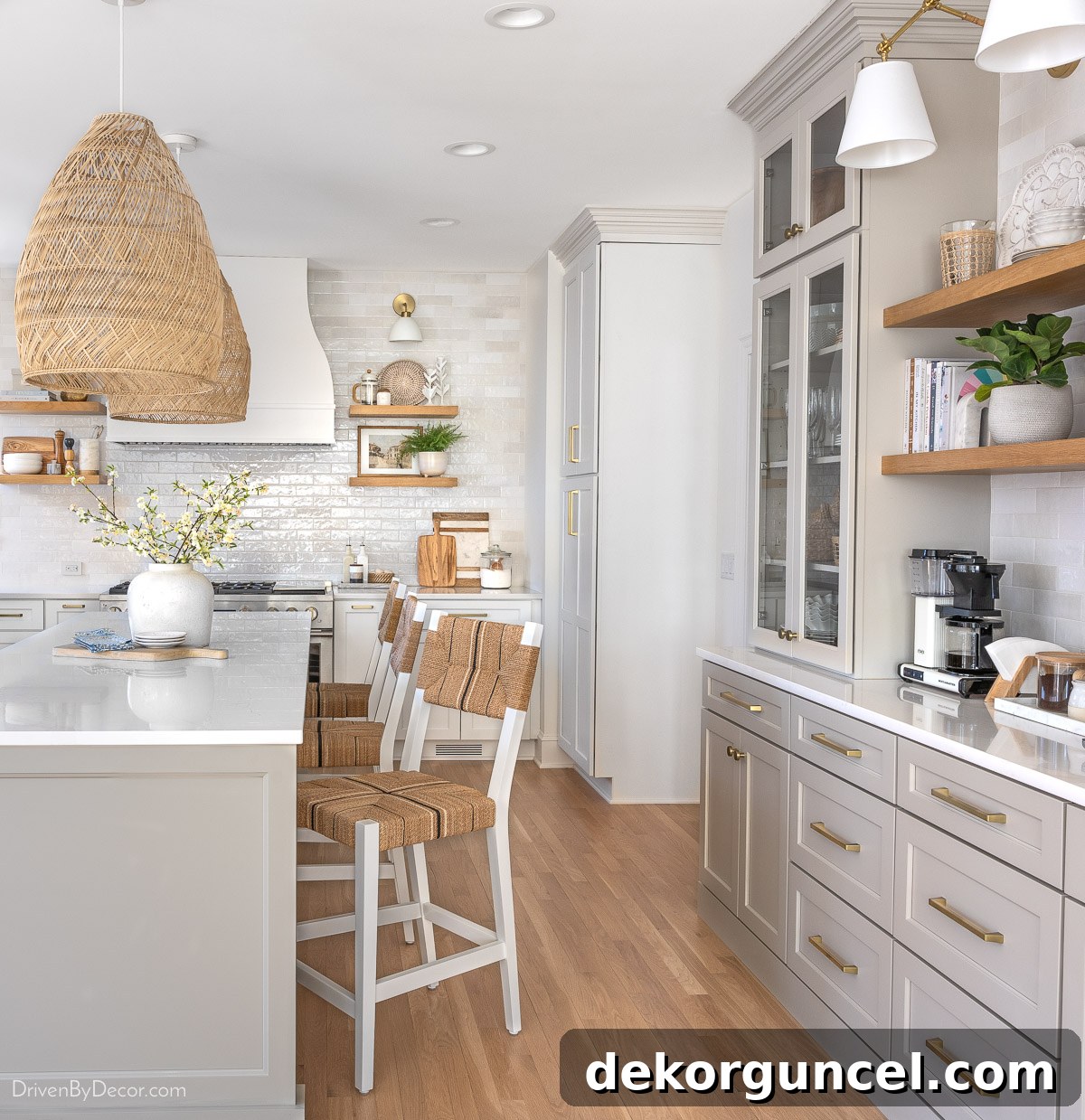 The "after" of our kitchen remodel reveal, featuring sleek countertops and modern fixtures