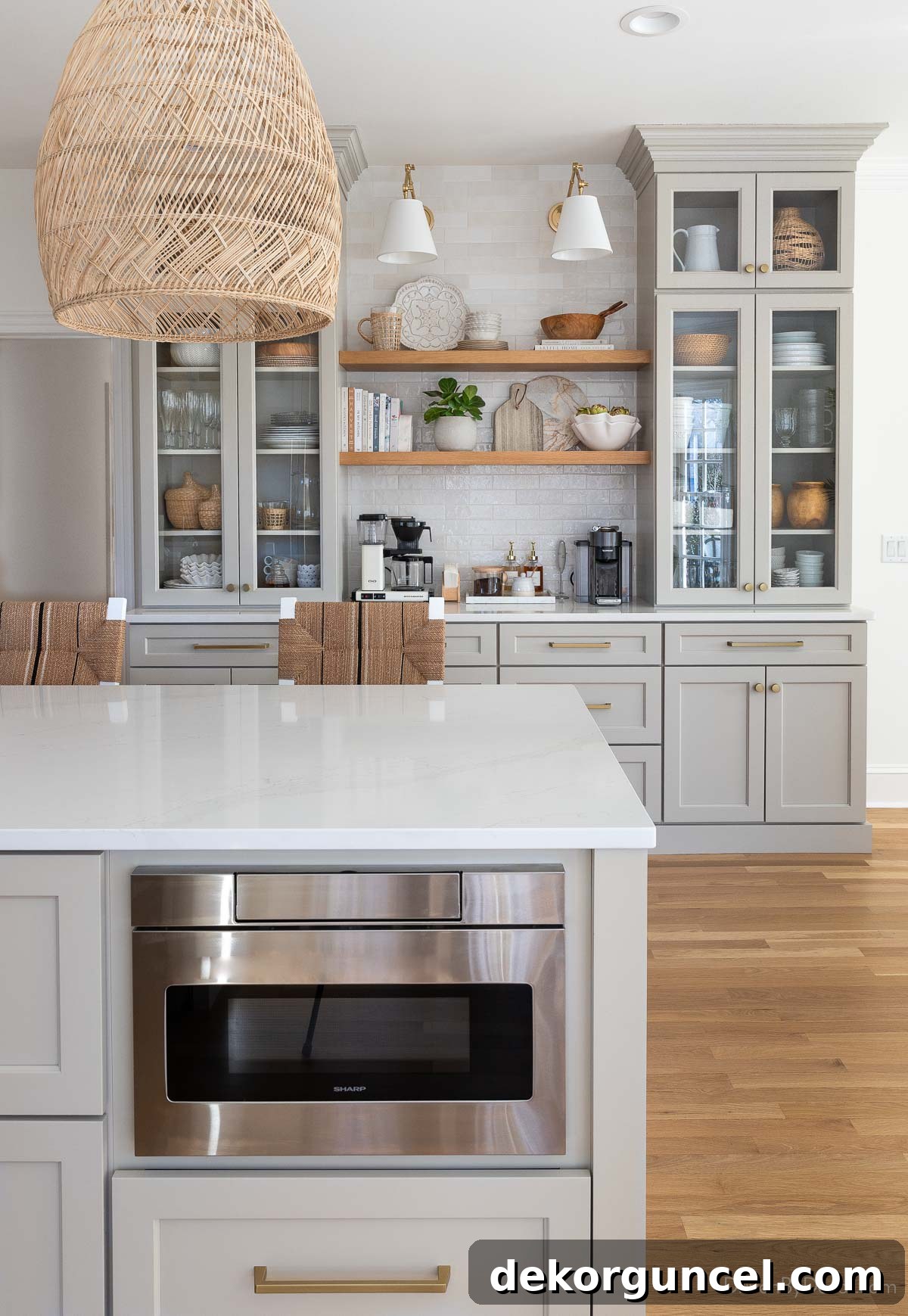 Gray island and integrated coffee bar cabinets in our beautifully remodeled kitchen, showcasing new functionality