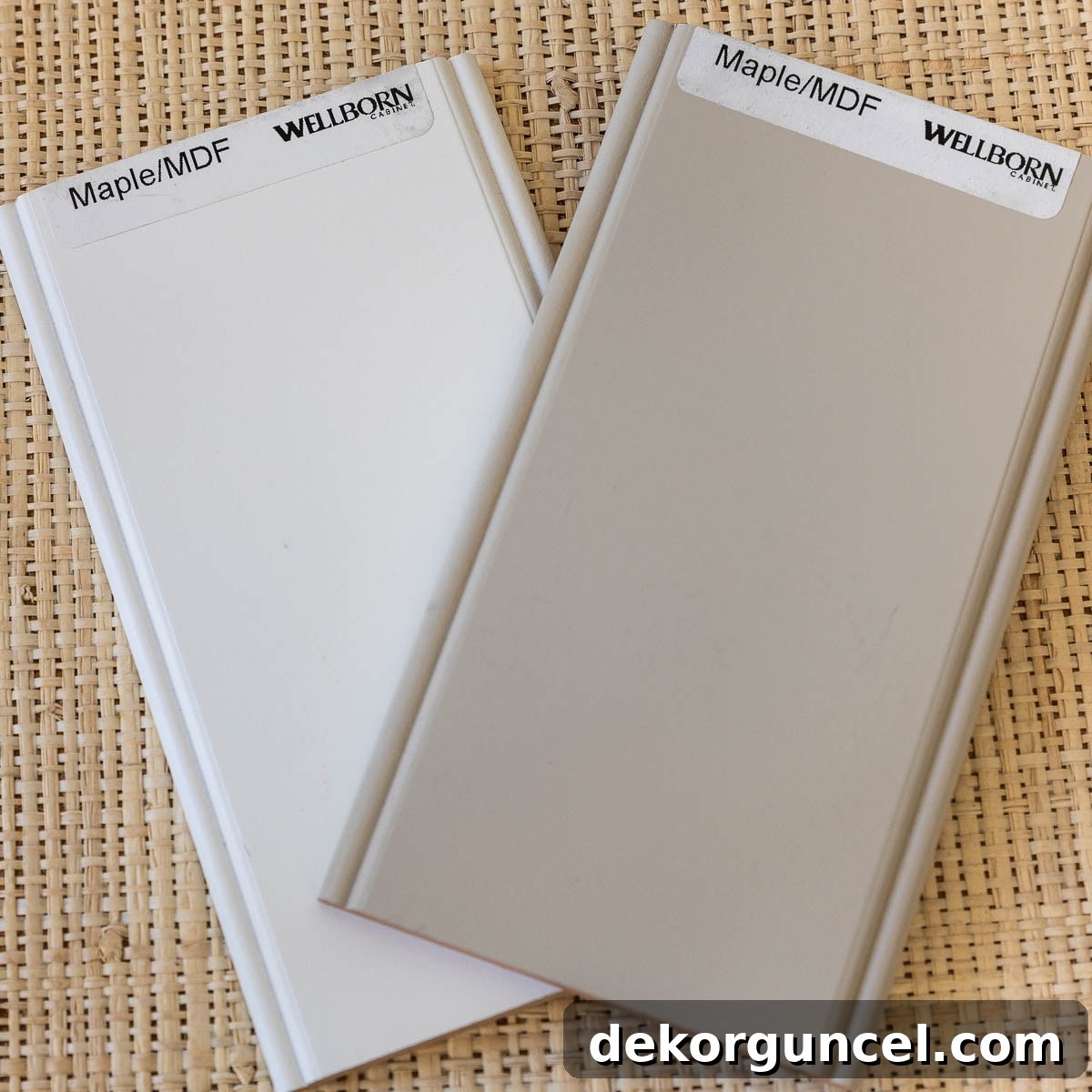 Wellborn kitchen cabinet color samples, showing Glacier White and Gray Mist