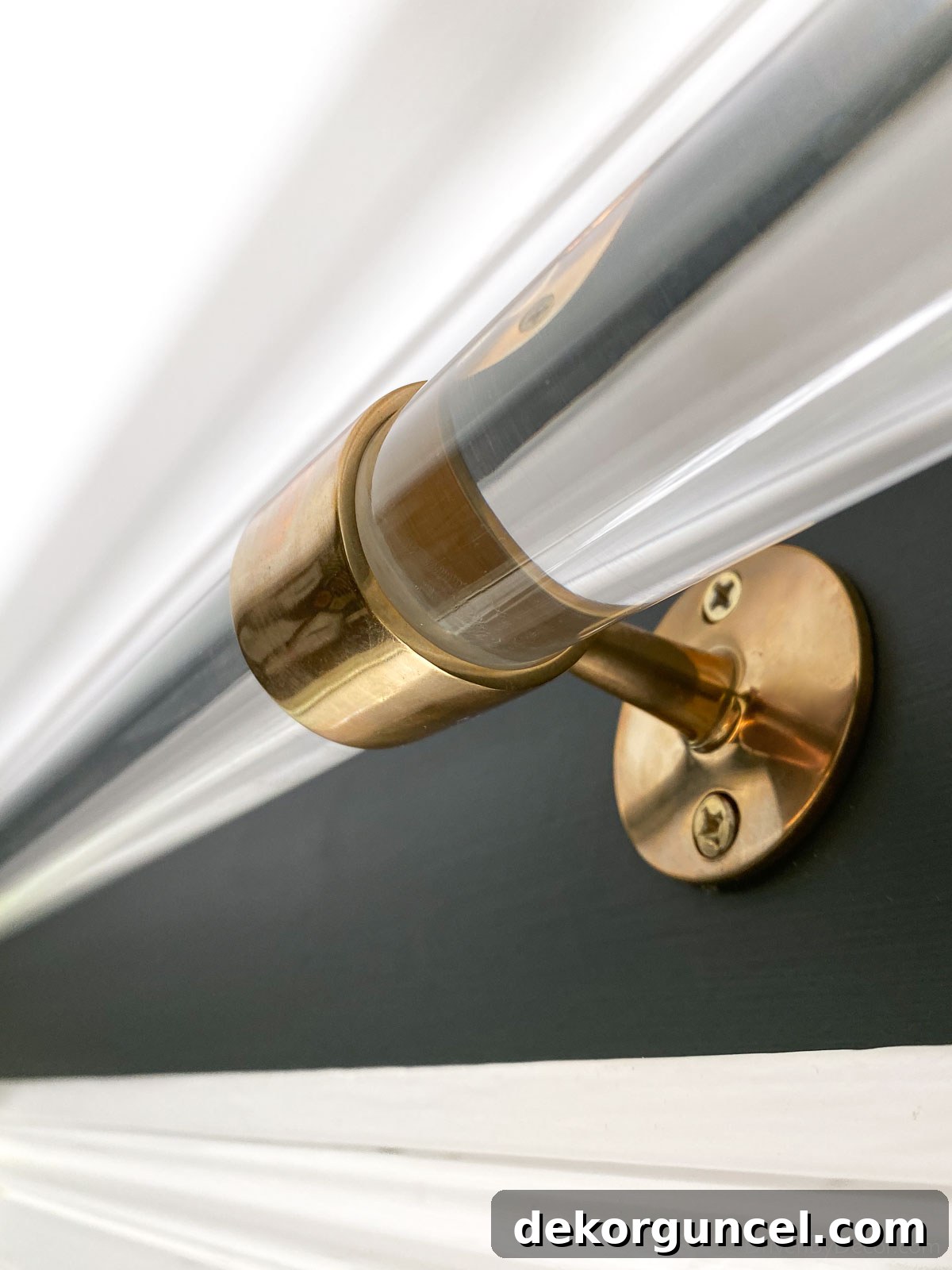 Polished brass bracket for acrylic rod
